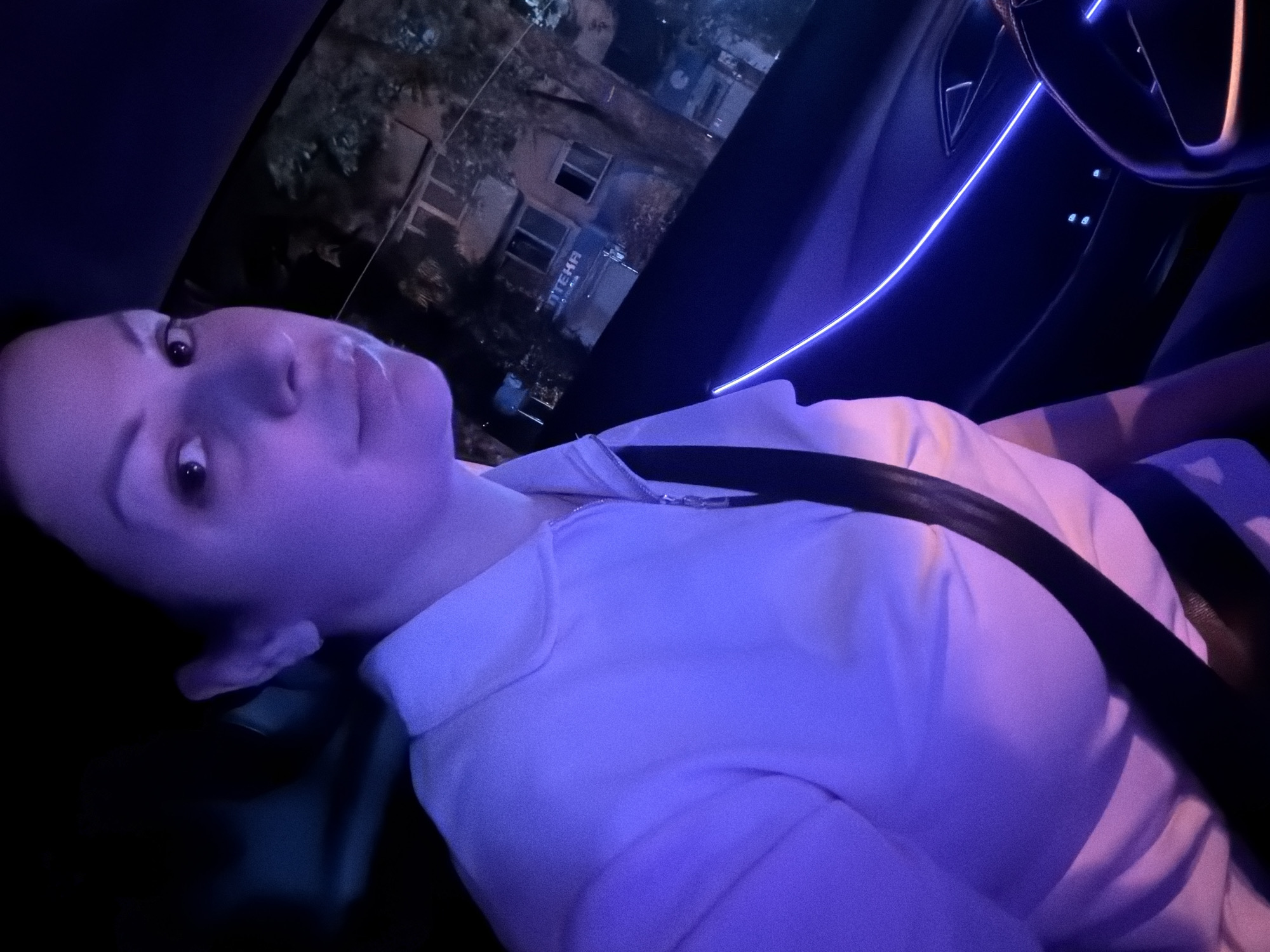 Night ride through Sochi, ambient-lit car interior and city streets.