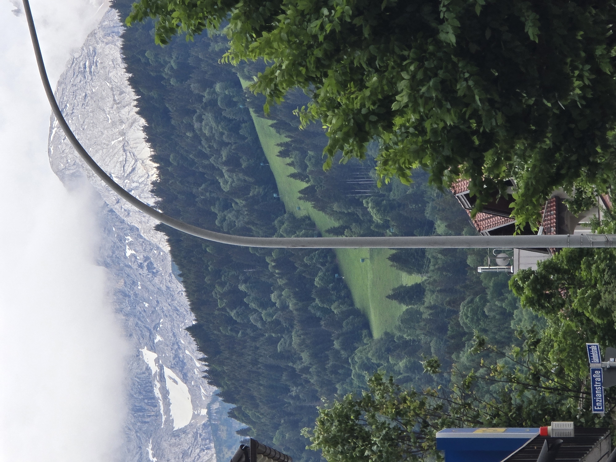 Tourist documents scenic Bavarian alpine town in five-minute photo sequence