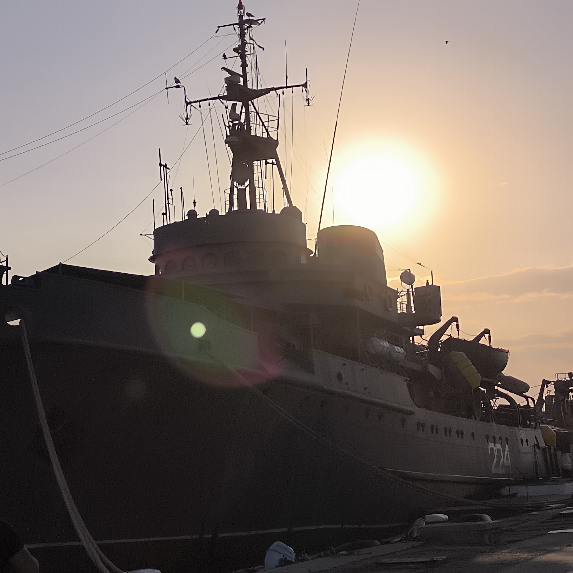 Naval vessels, rowing crews, and waterfront scenes at Varna port
