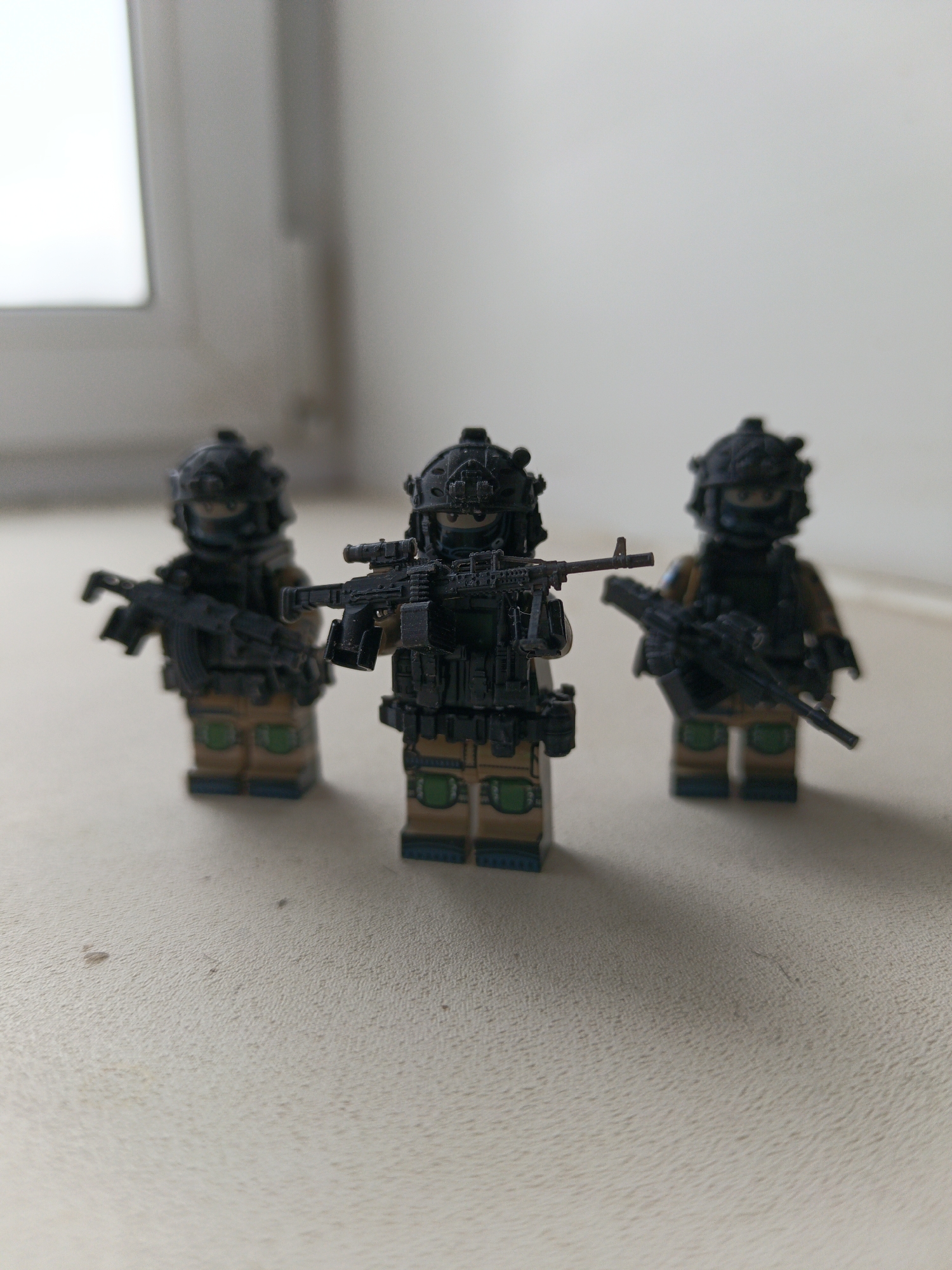 Military-themed Lego collection displayed in coordinated arrangement