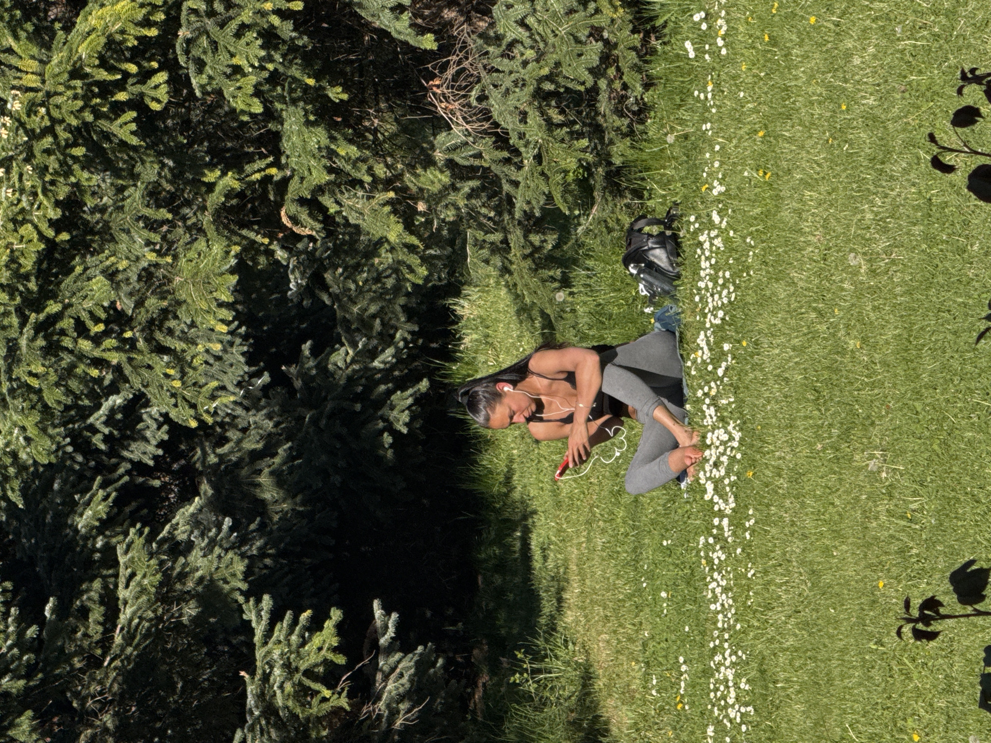 Woman takes break from cycling in Sofia park