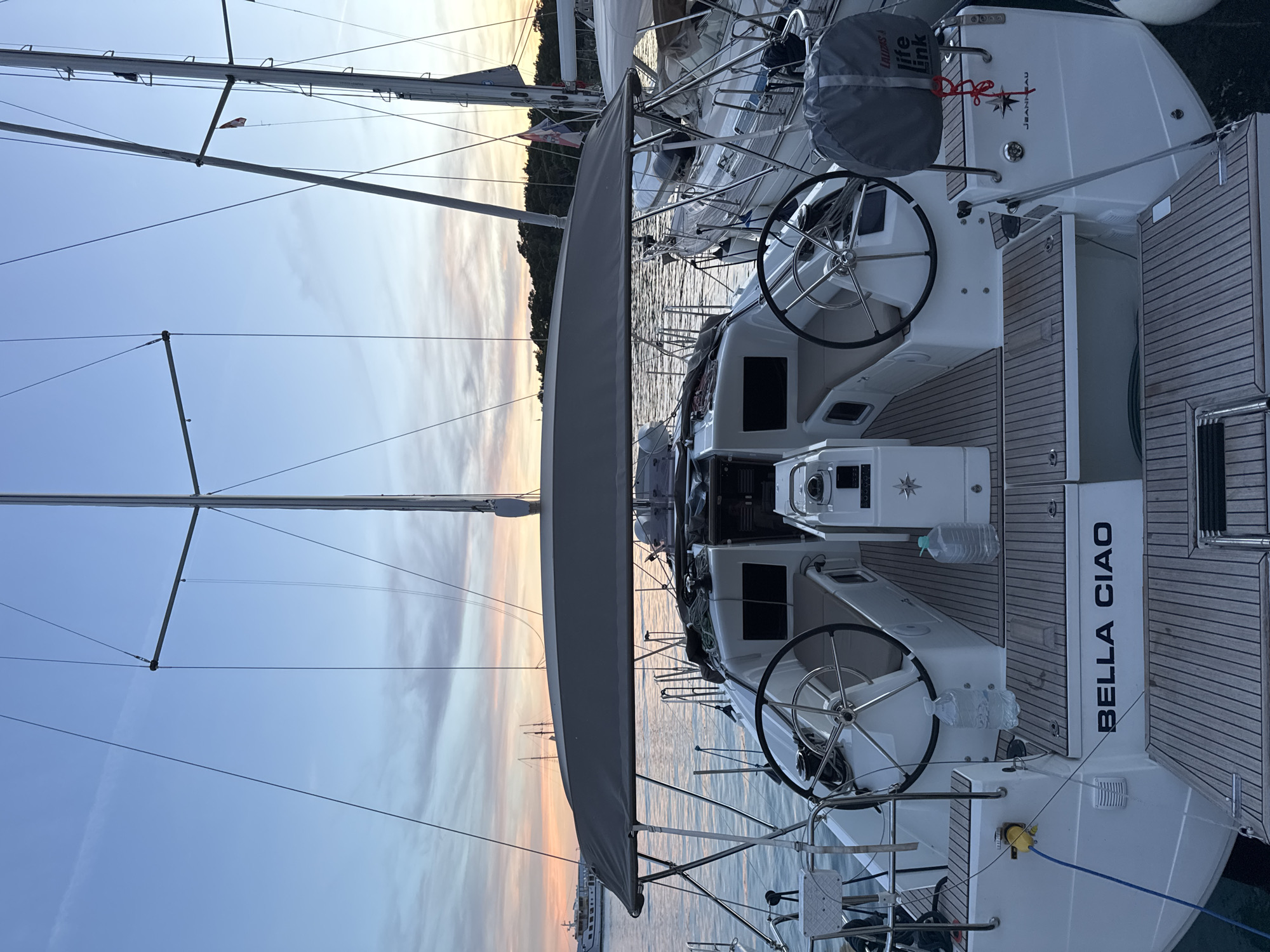 Sunset harbor scenes in Makarska Croatia with luxury yachts