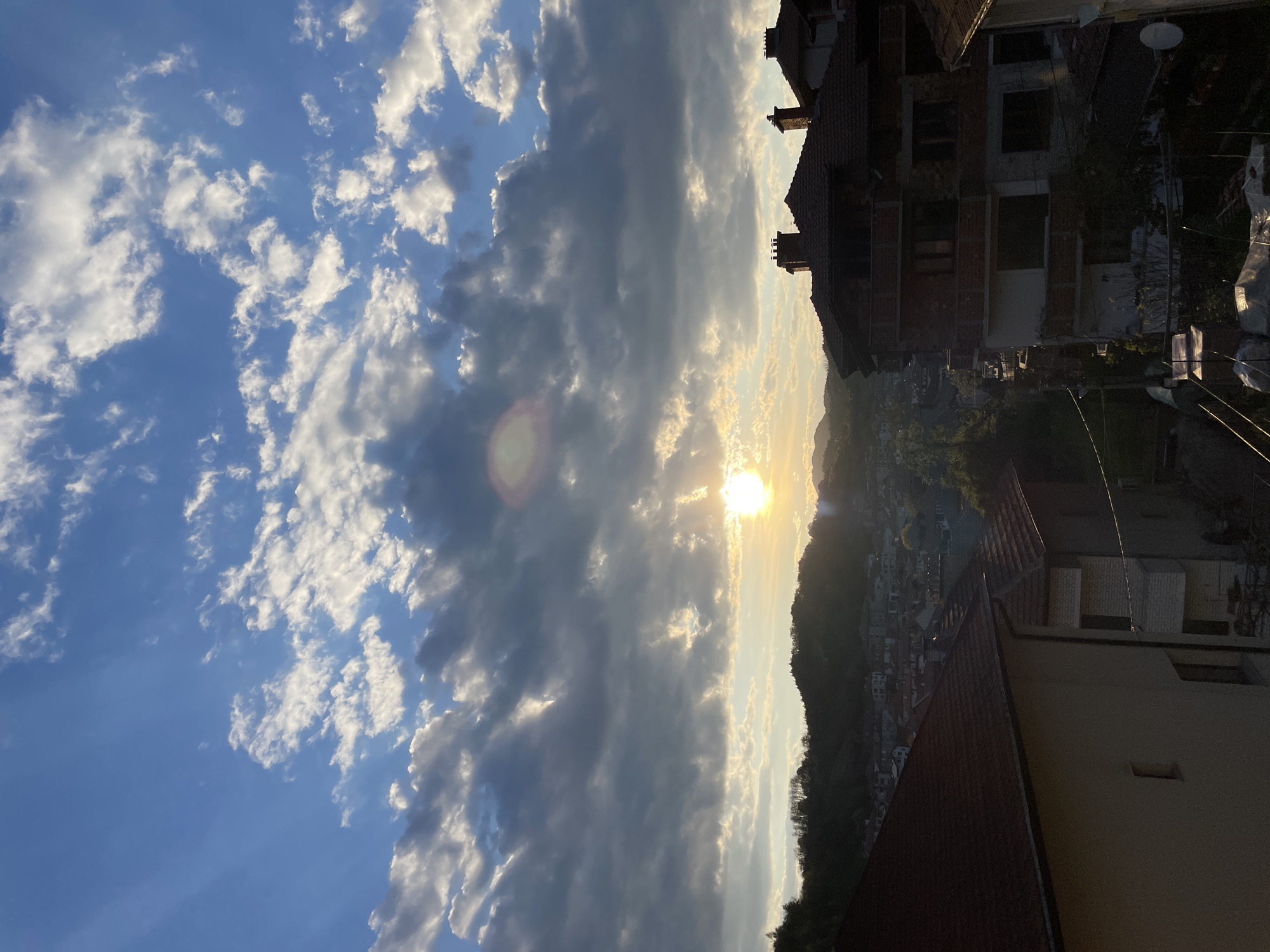 Sunset captured over red rooftops in Zlatograd, Bulgaria