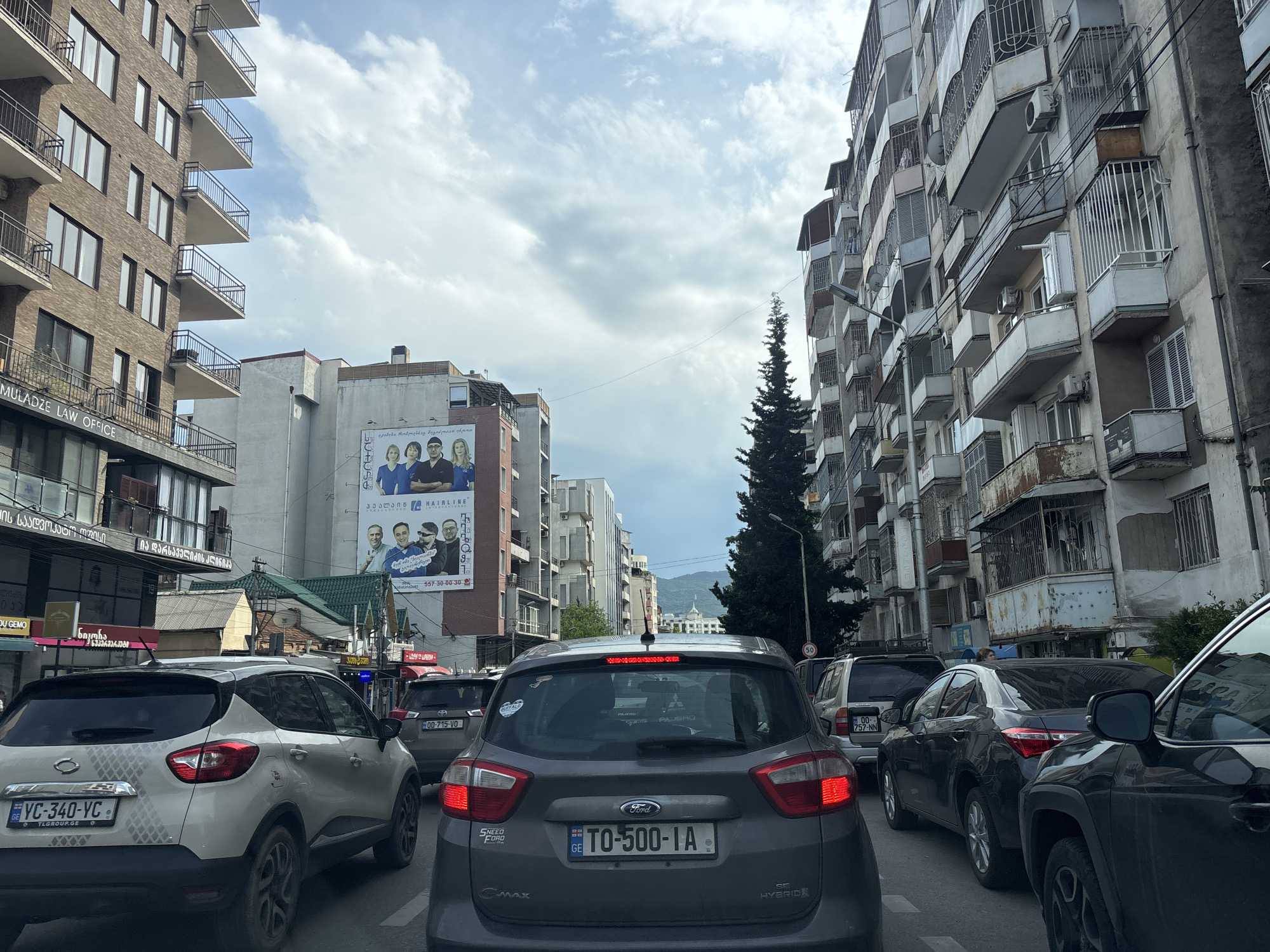 Ordinary urban moments documented across Tbilisi neighborhoods