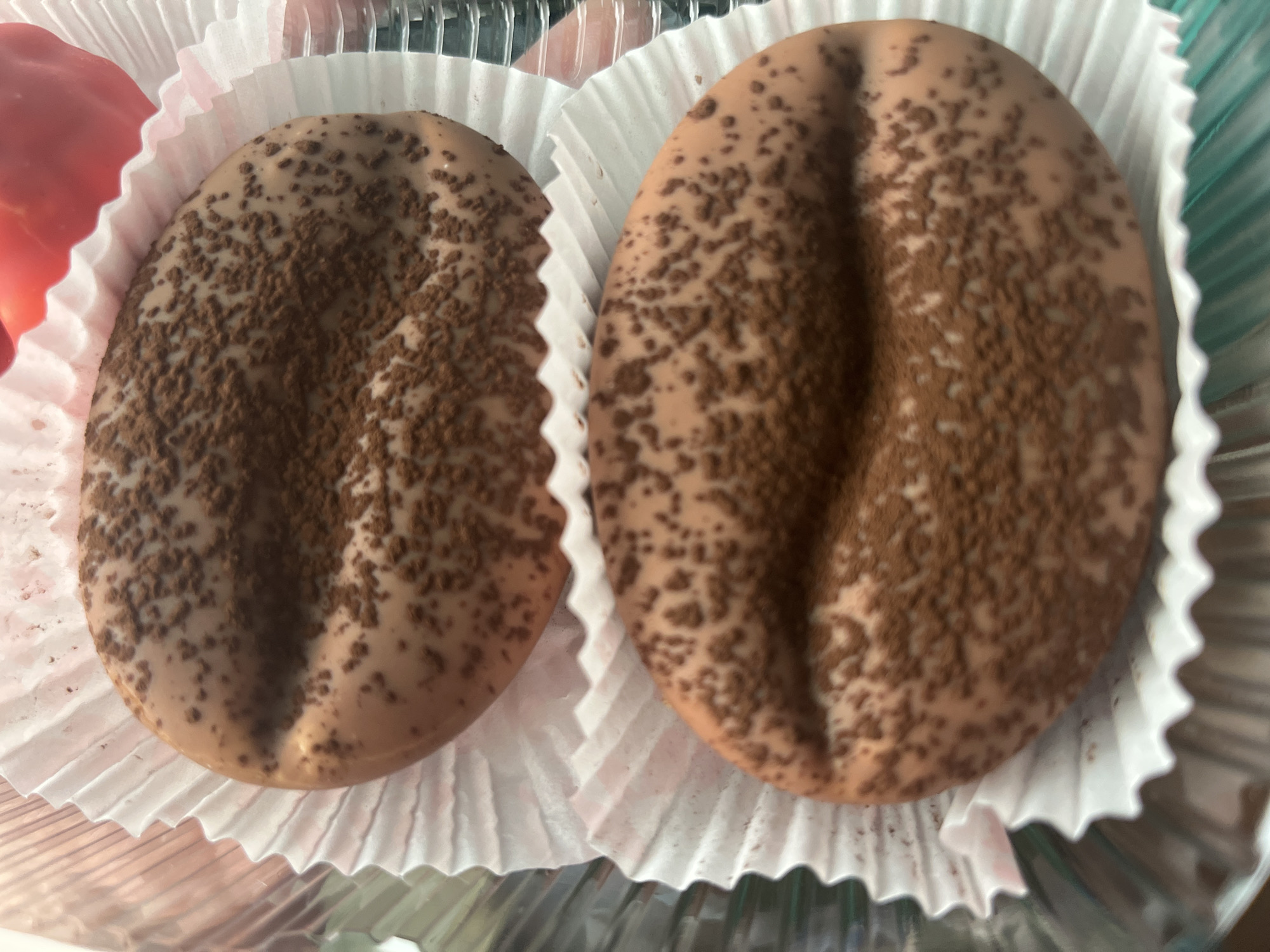 Assorted pastries and chocolate confections in a Desyatikhatka bakery box