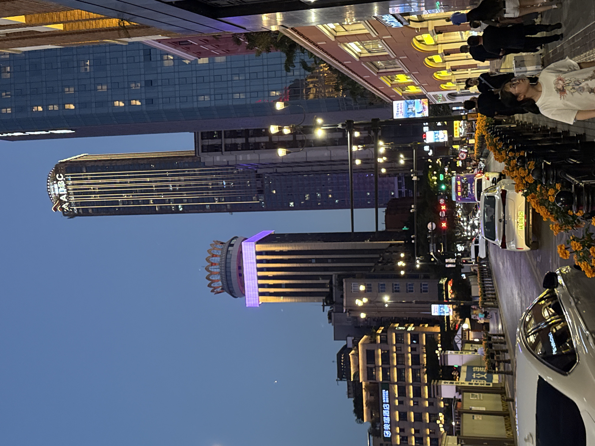 Chongqing's Yuzhong District glows at dusk along the Yangtze