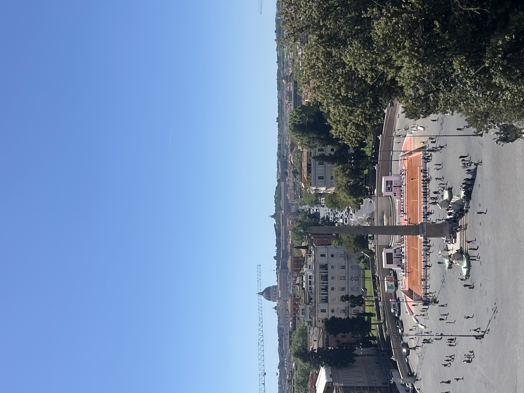Sunny day recreation captured in Rome city square
