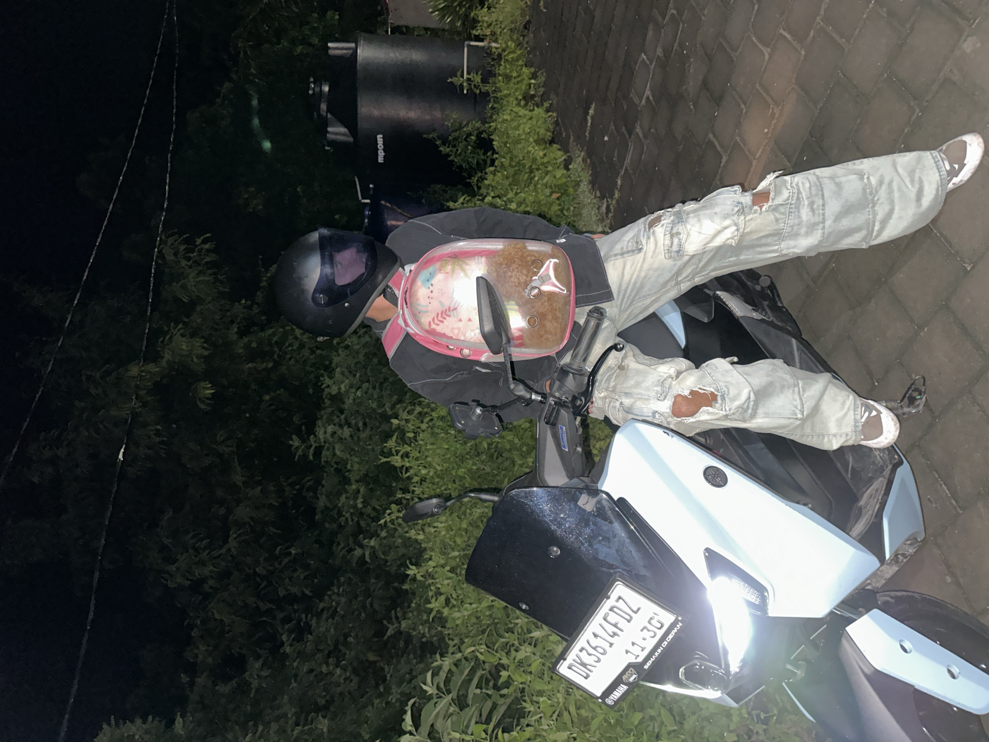 Motorcyclist photographed on Yamaha scooter in Kuta Selatan