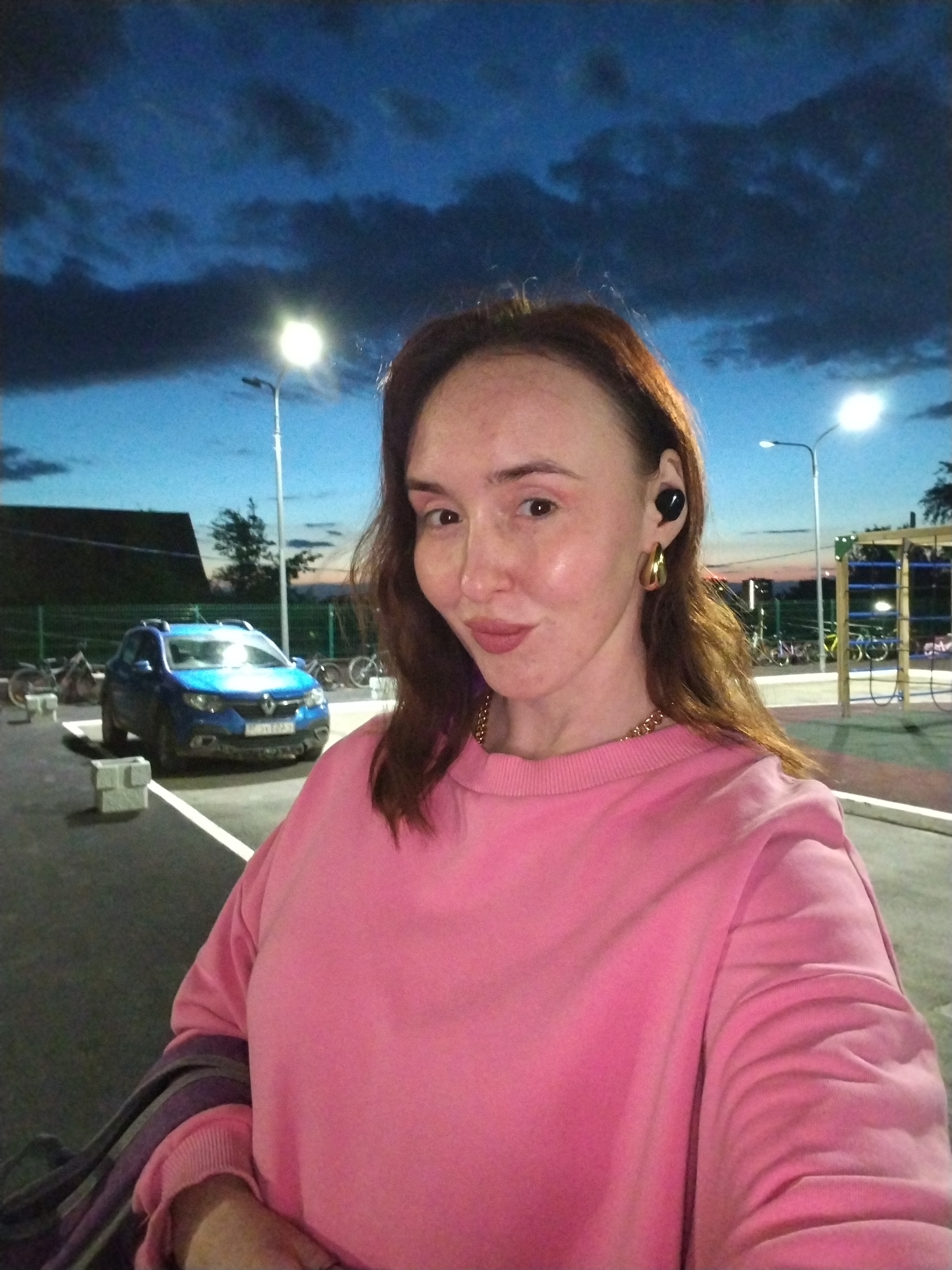 Woman documents evening routine in Izhevsk residential area