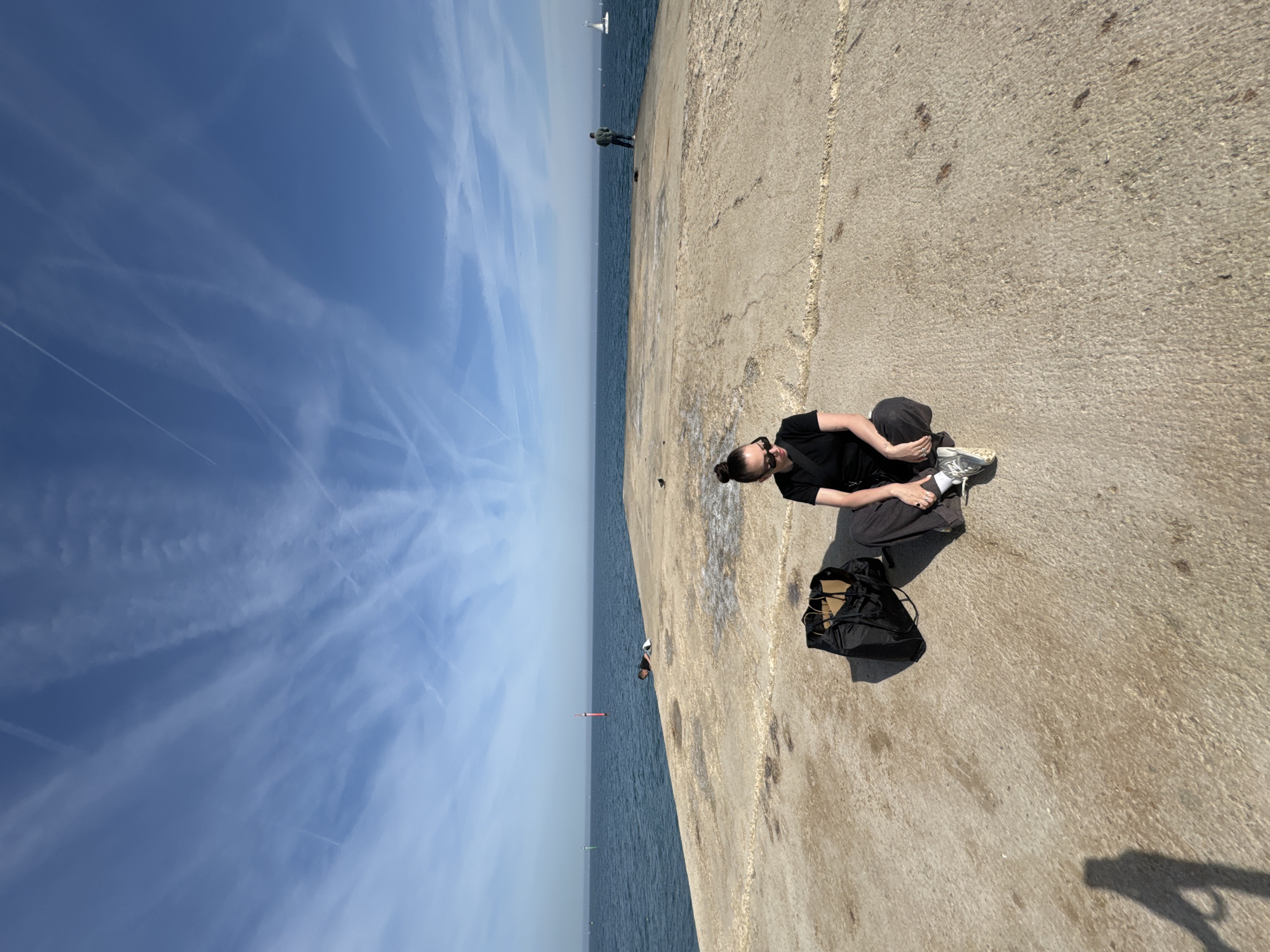 Afternoon leisure activities observed on Barcelona waterfront pier