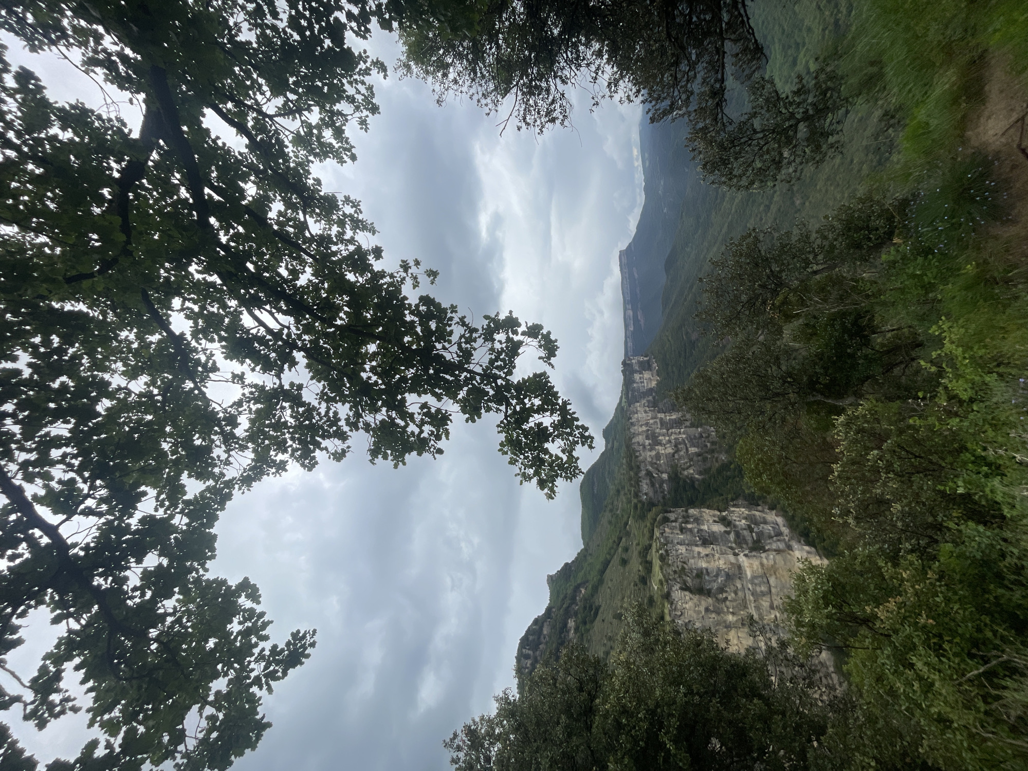 Hiker documents dramatic cliffs and forests in Rupit i Pruit