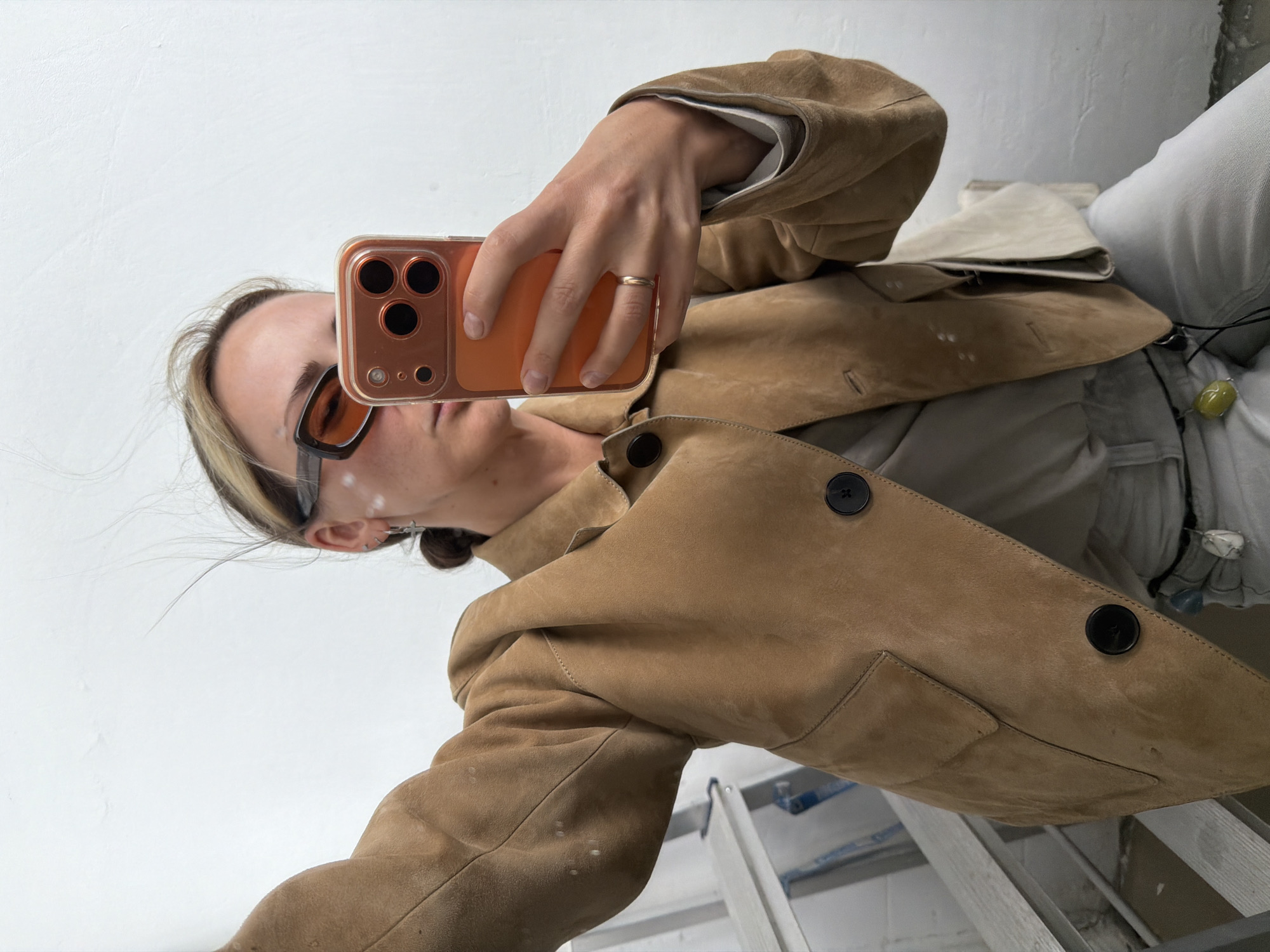 Person takes selfies during rainy day in Khimki, Russia