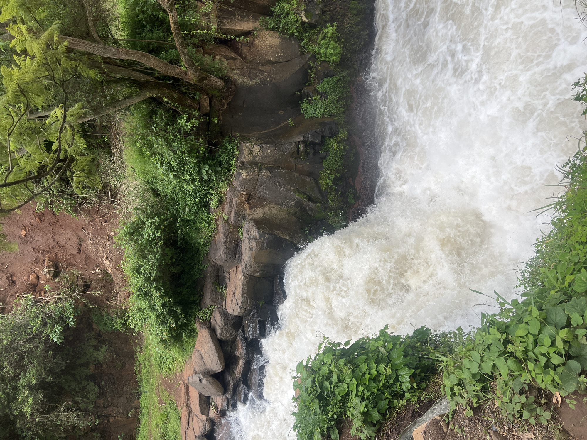 Waterfall captured amid lush vegetation in Nyeri, Kenya