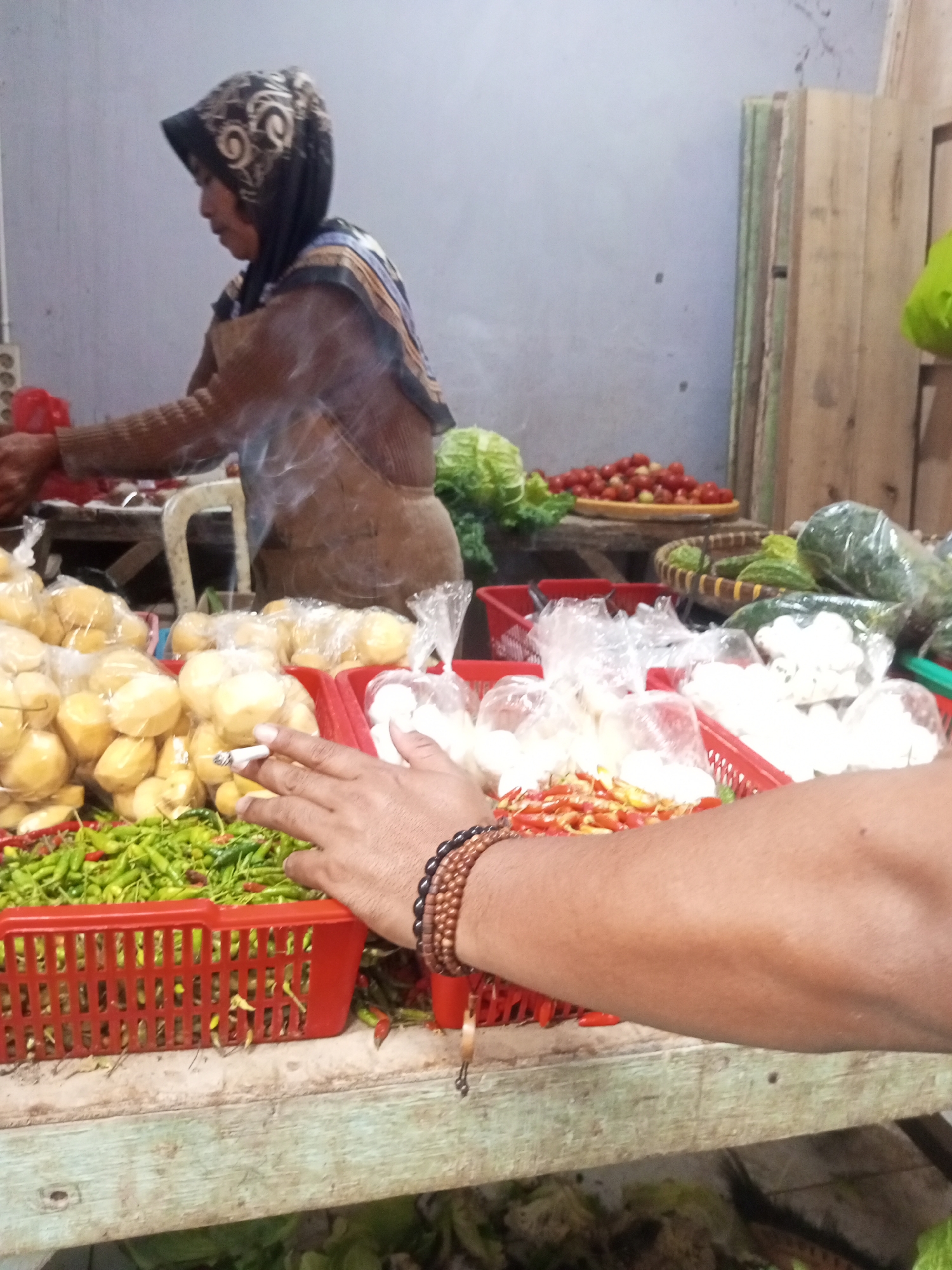 Early morning market activity in Kalibeber, Indonesia