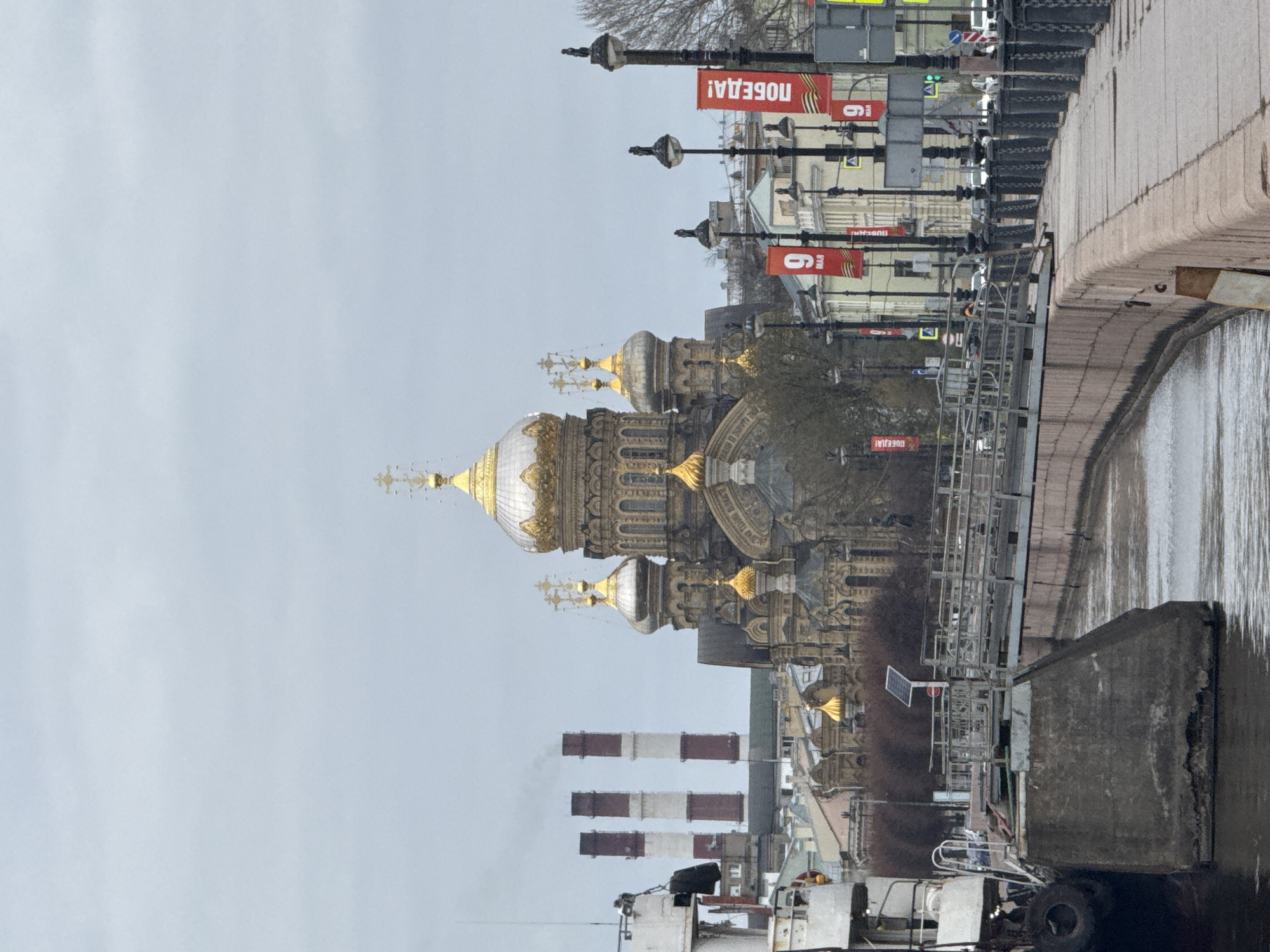 Golden-domed cathedral documented in Saint Petersburg morning scene