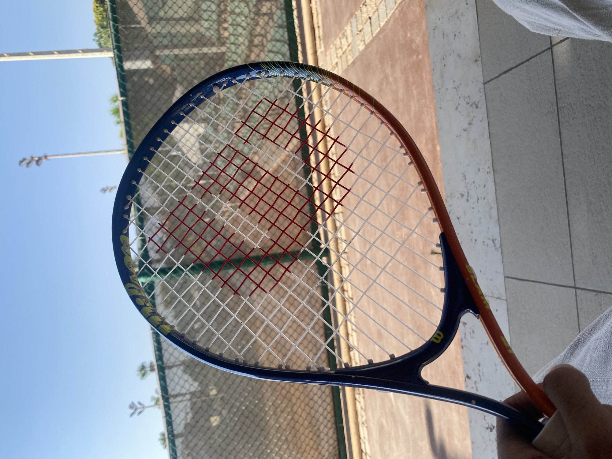 Afternoon tennis session at a clay court in Sheikh Zayed