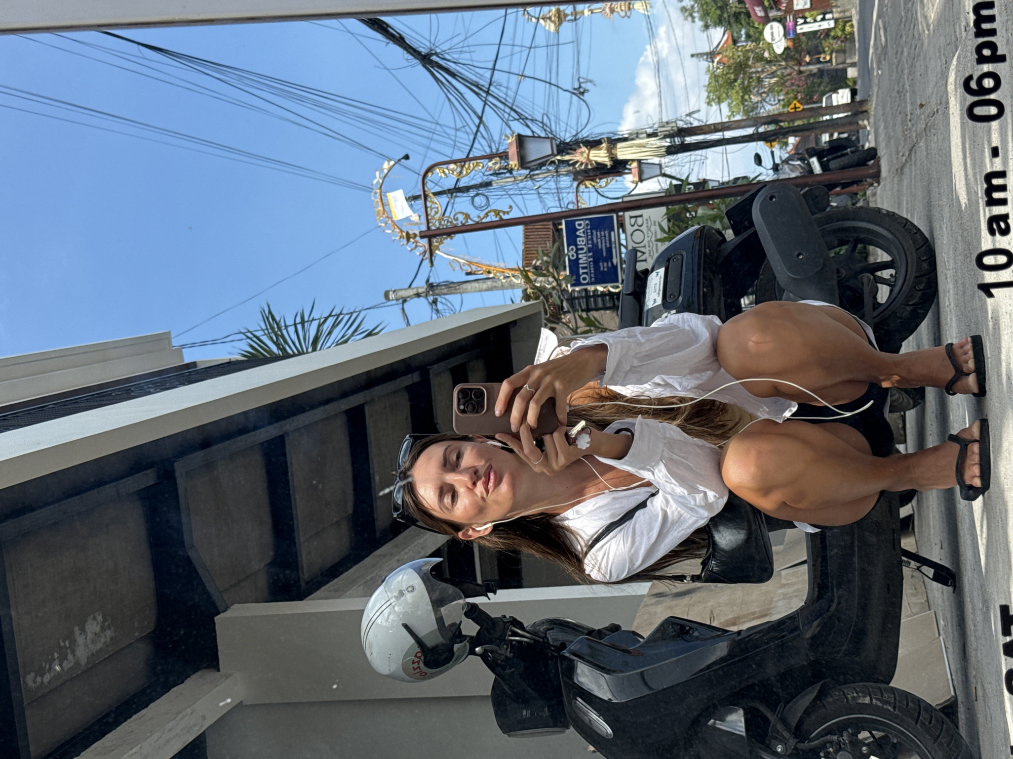 Mirror selfies outside a North Kuta nail salon