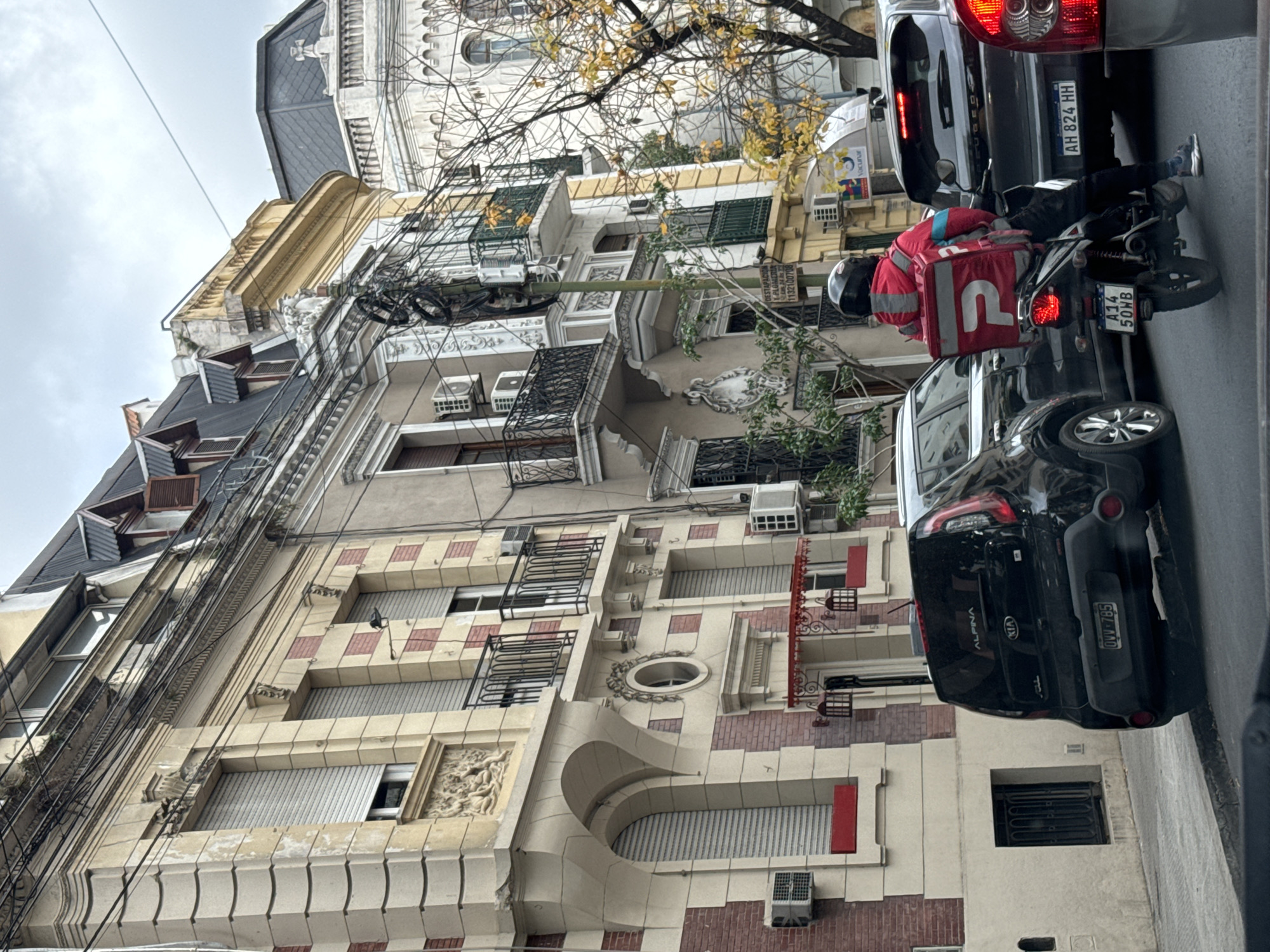 Vehicle travels through Buenos Aires streets capturing everyday traffic scenes