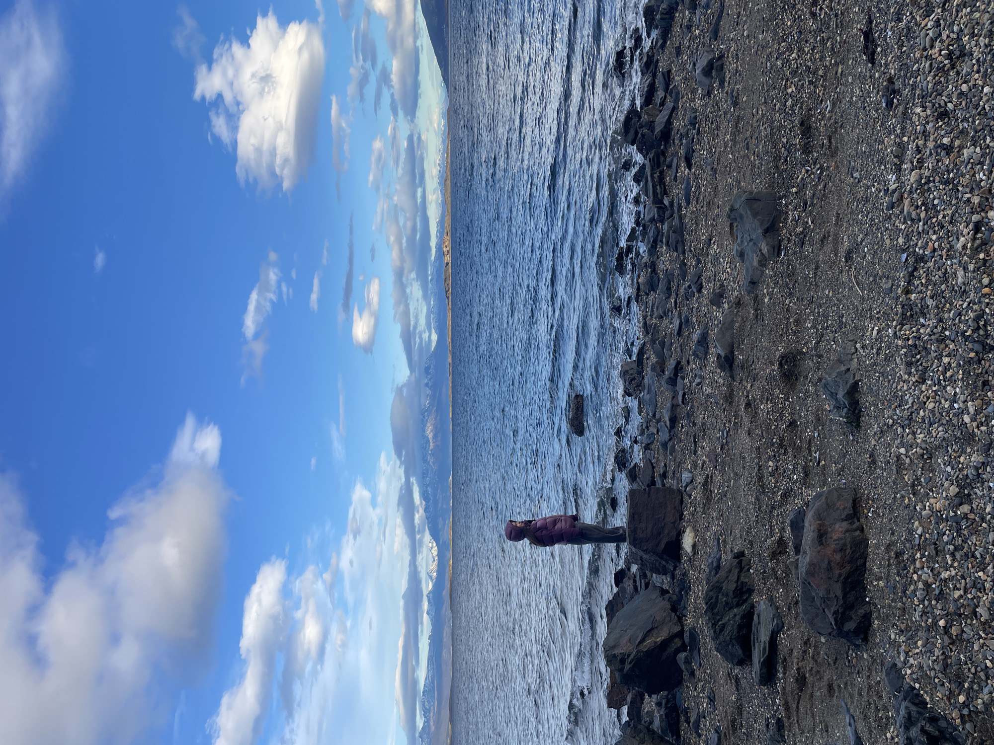 Visitors enjoy scenic waterfront views in Ushuaia, Argentina