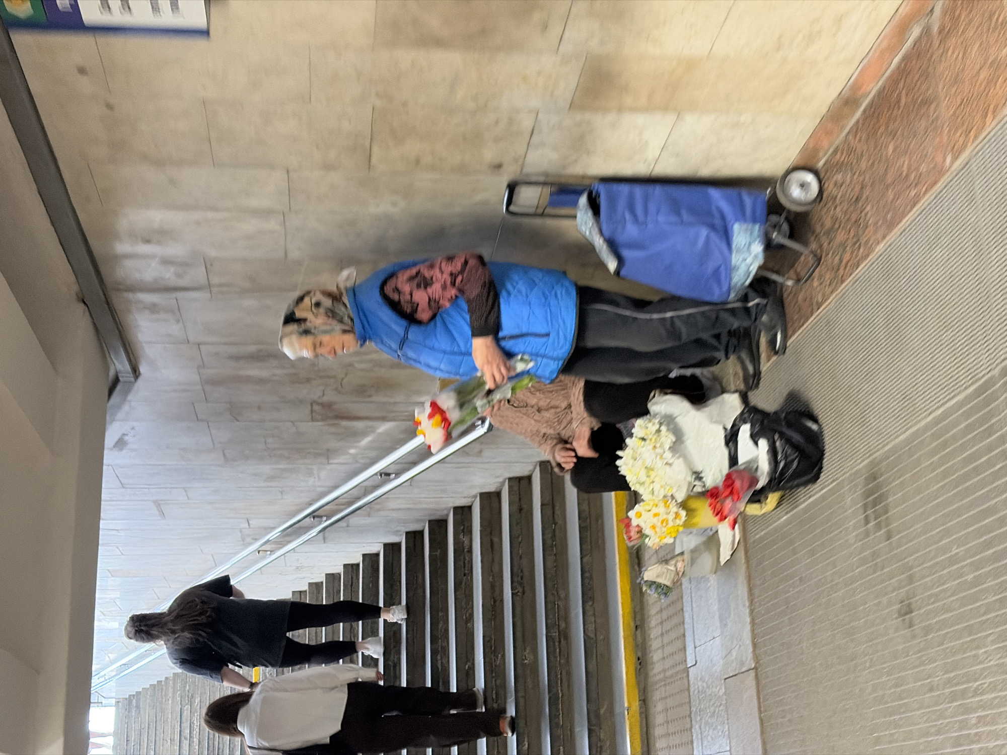 Flower vendor and laptop user spotted in Belarus village