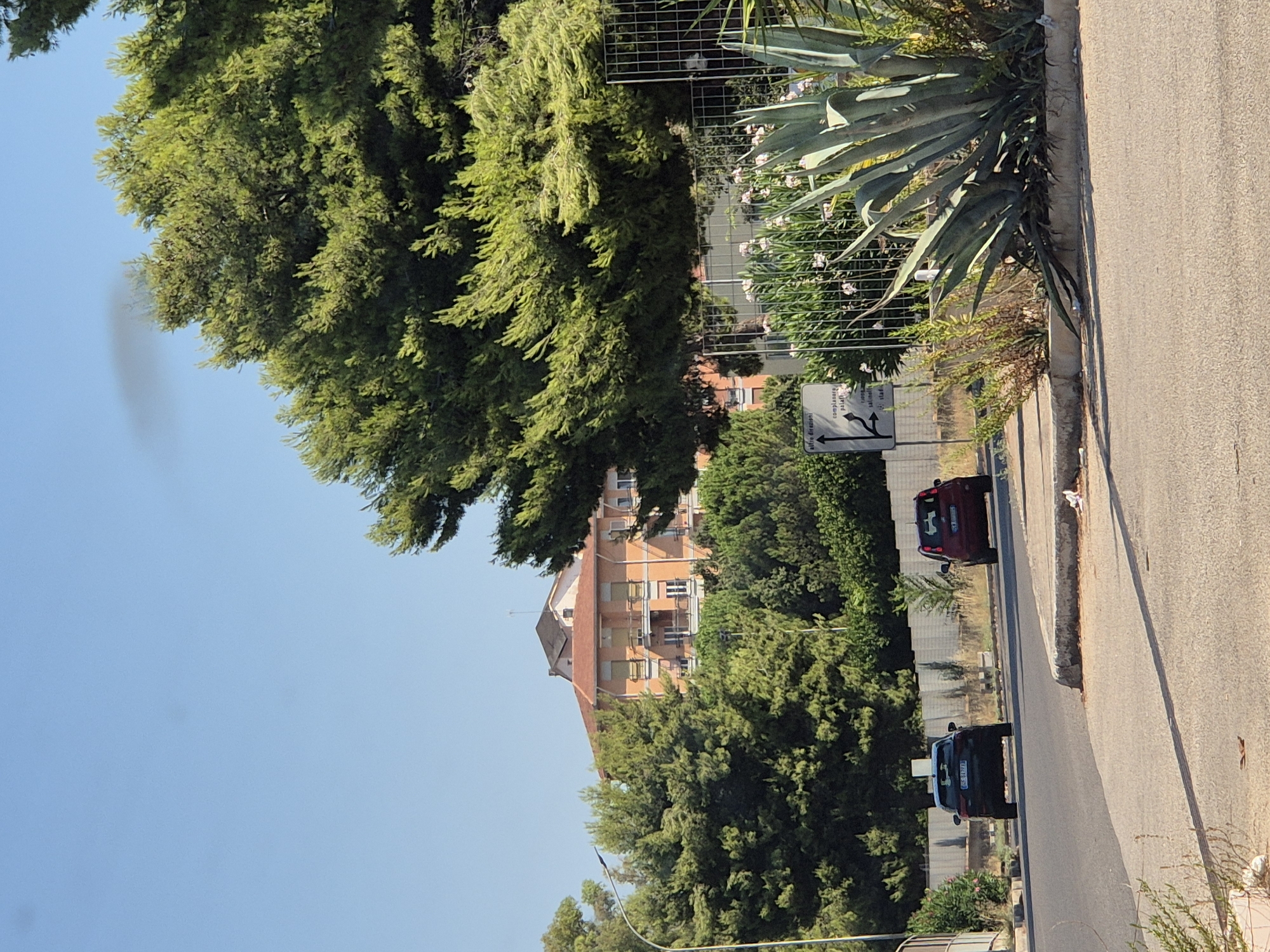 Everyday street activity around Taranto on a summer morning.