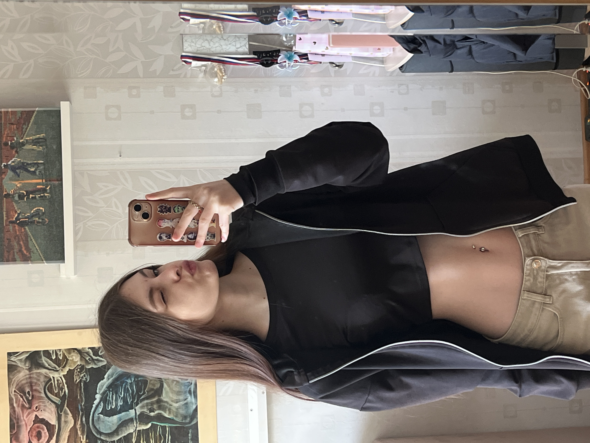 Woman Takes Mirror Selfies in Saint Petersburg Bedroom