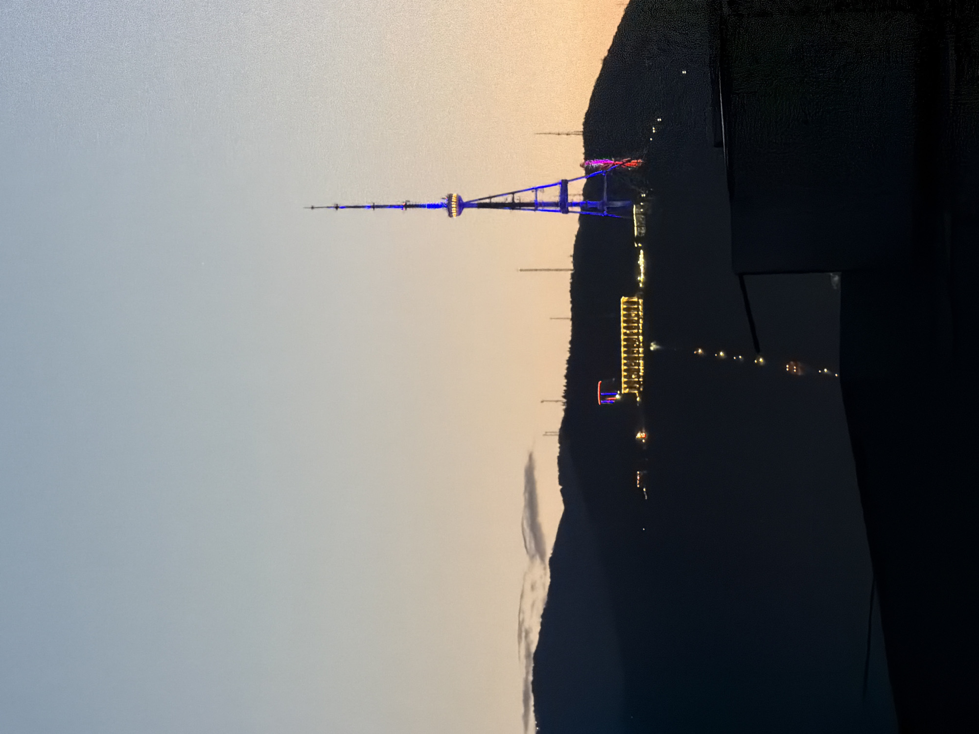 Tbilisi TV Tower Displays Blue-Purple Light Show at Dusk