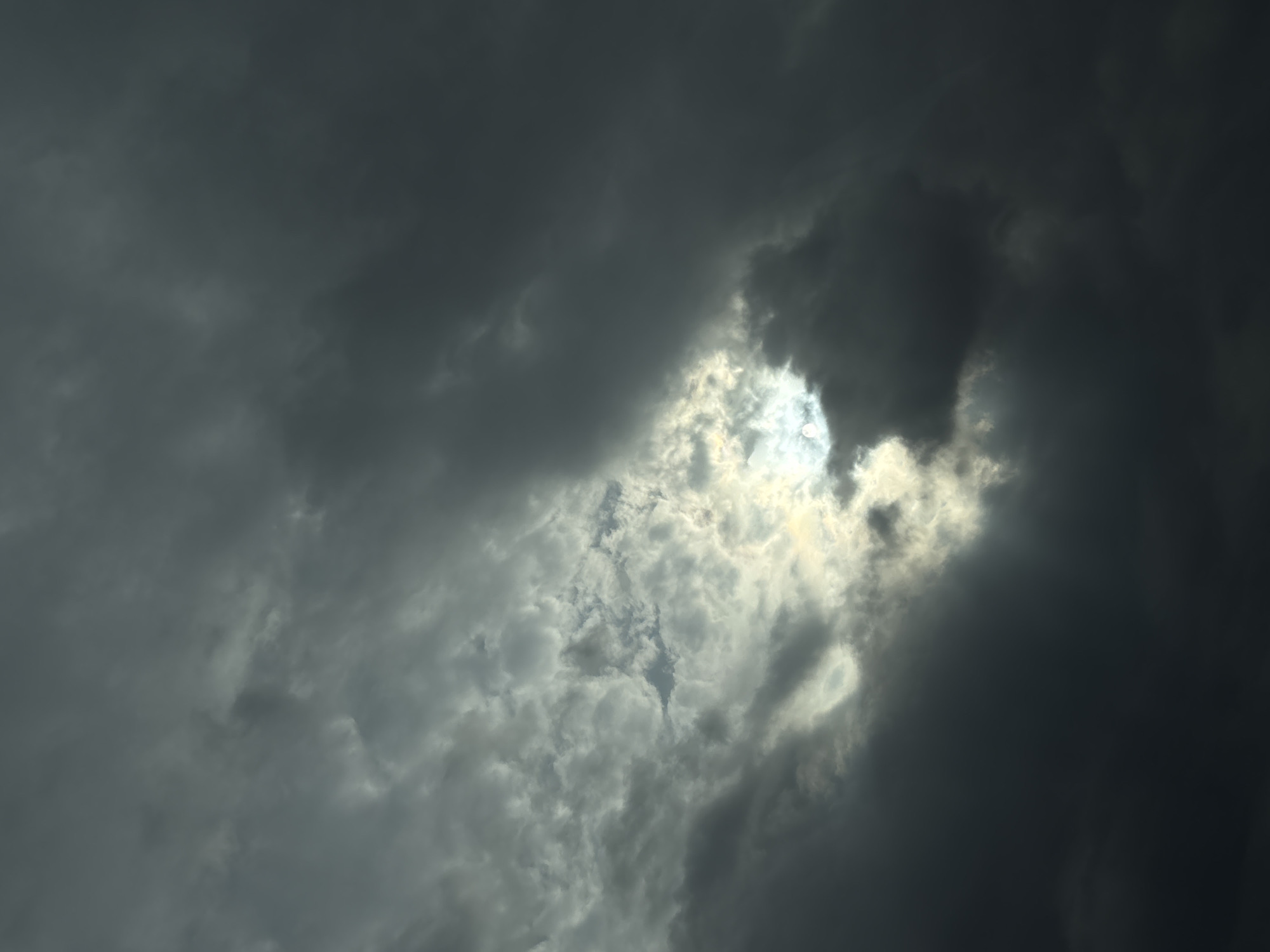 Sunlight breaks through stormy clouds over Burgas, Bulgaria