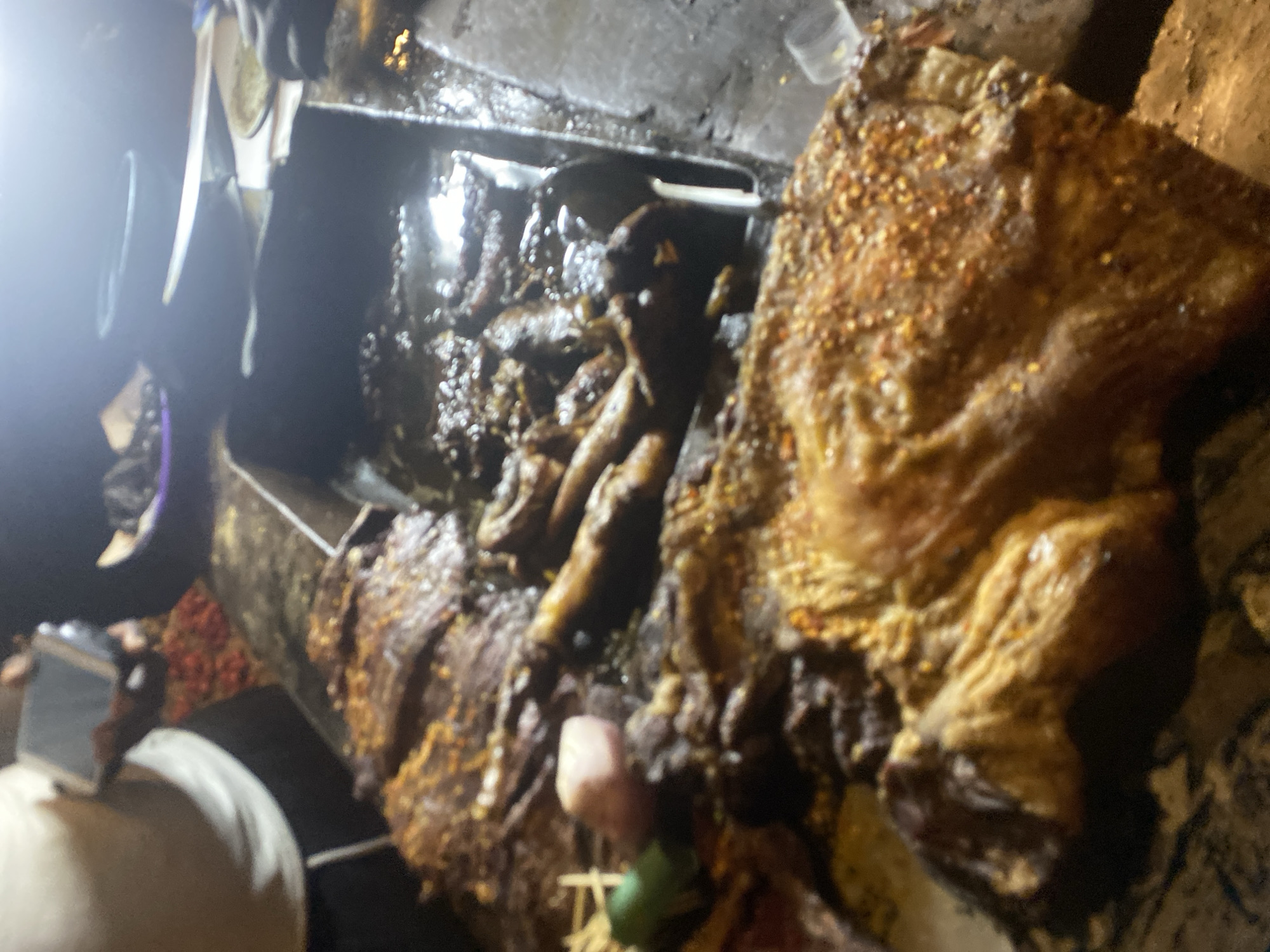 Nighttime street market bustles with activity in Bukuru, Nigeria