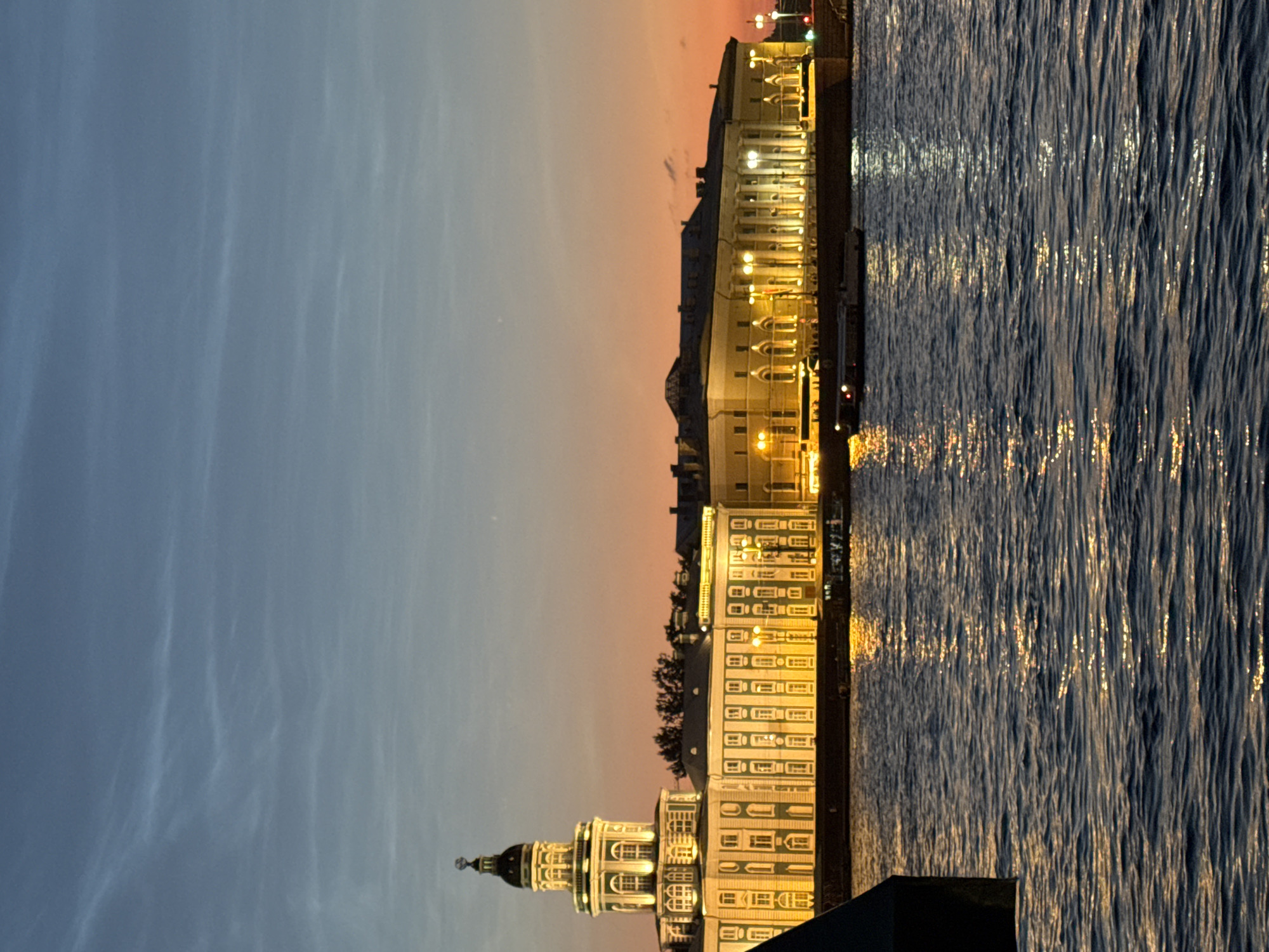 Dusk on the Neva: boats, bridges, and Saint Petersburg landmarks
