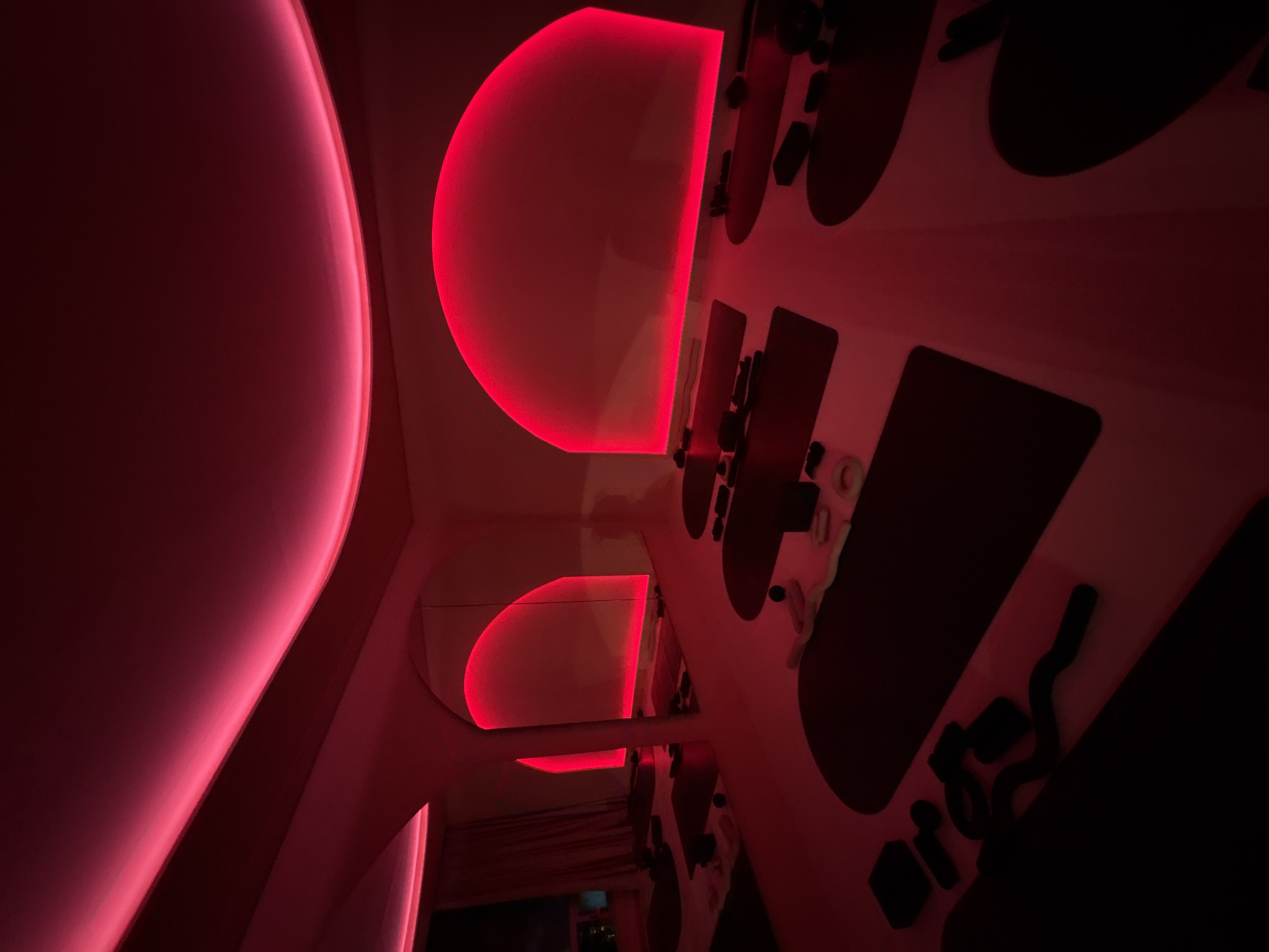 Inside a neon-lit yoga studio in Mexico City at night