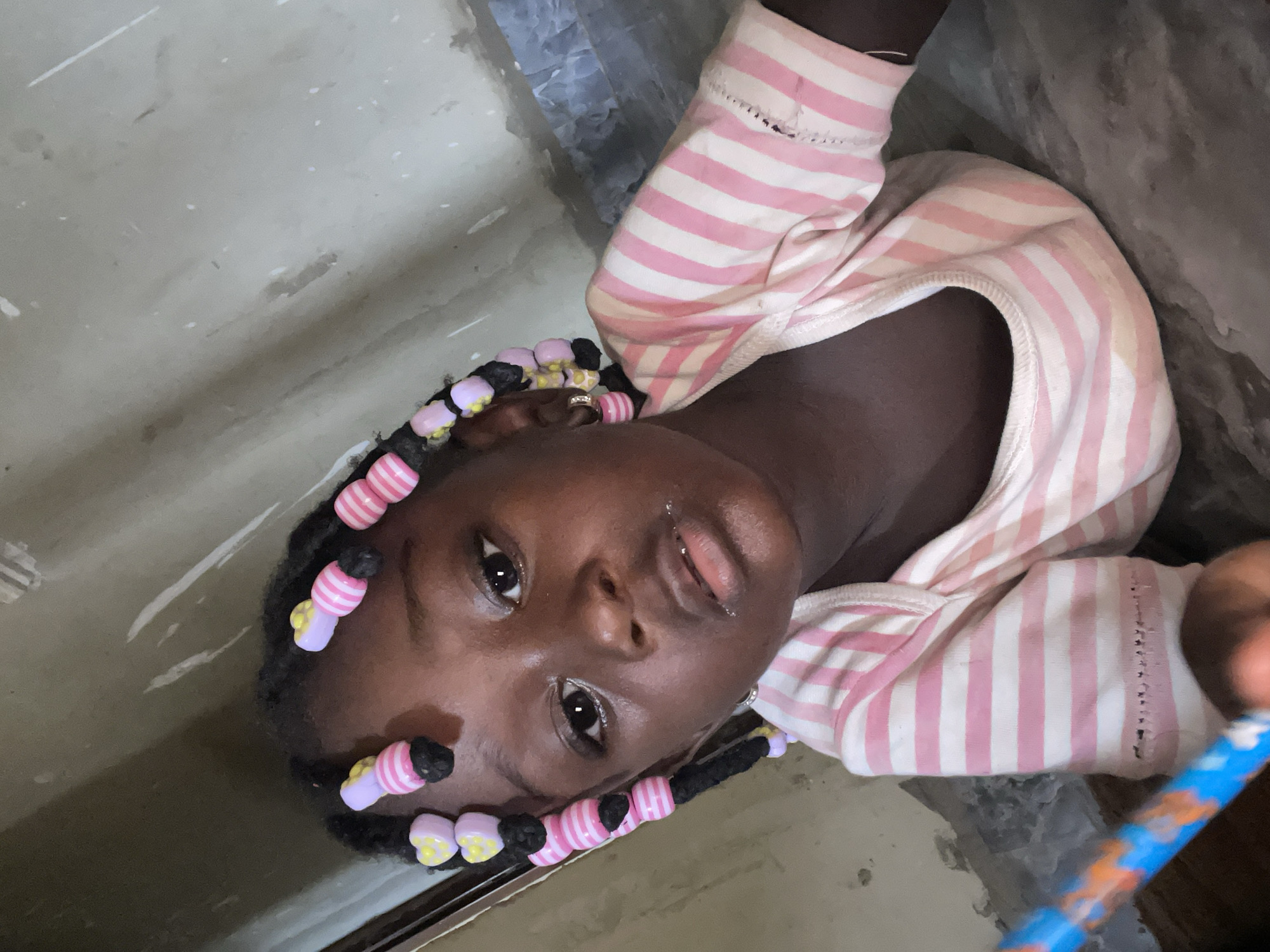 Young girl photographed in casual portraits in Akwanga