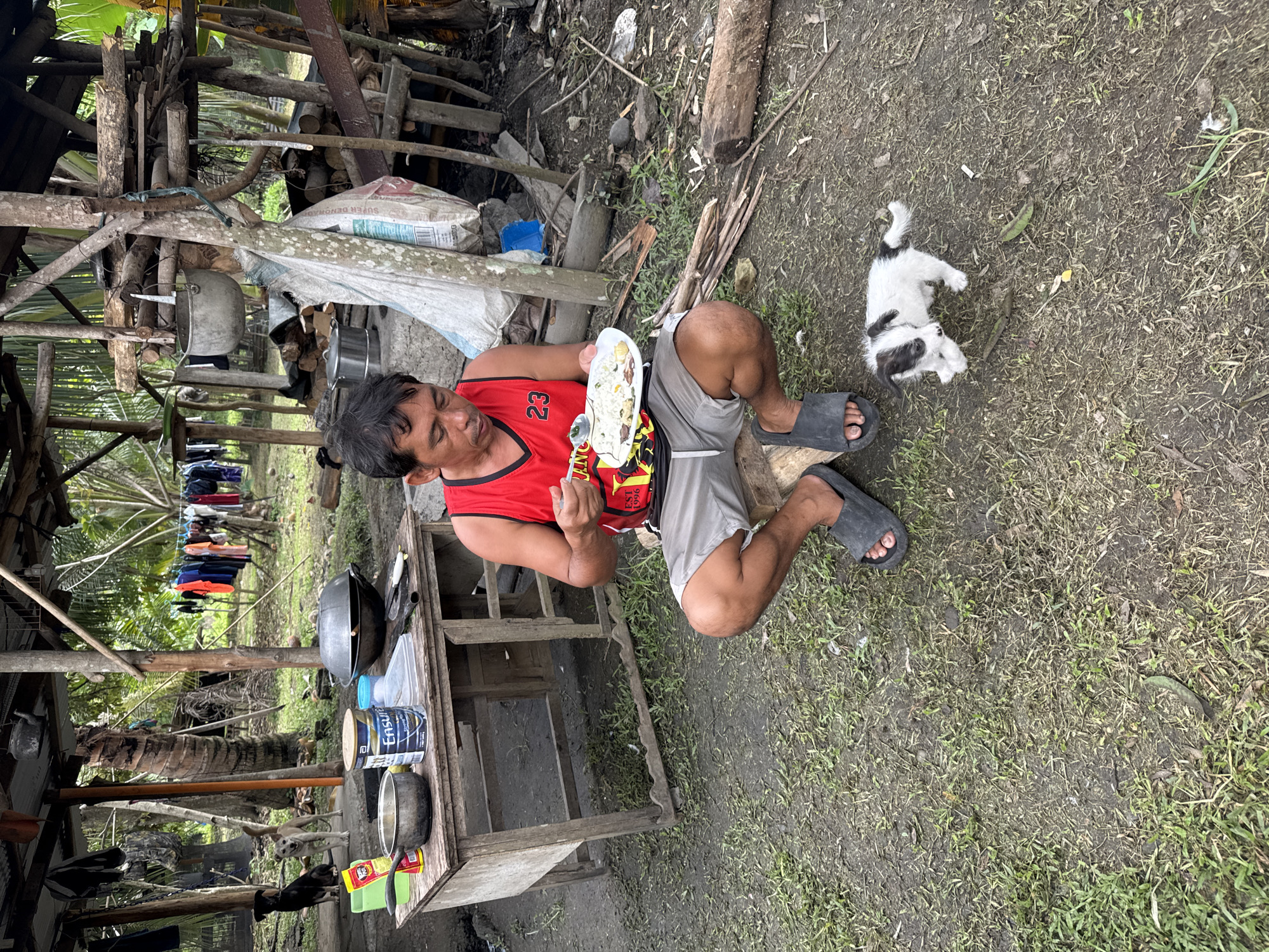 Traditional Filipino birthday celebration with communal outdoor feast in Carmen