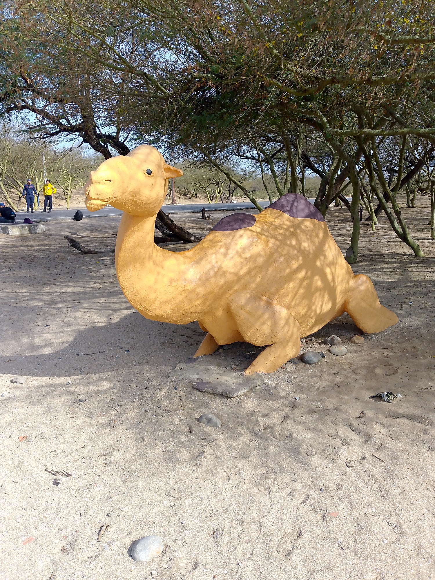 Tourist visits animal sculpture park in Coro, Venezuela