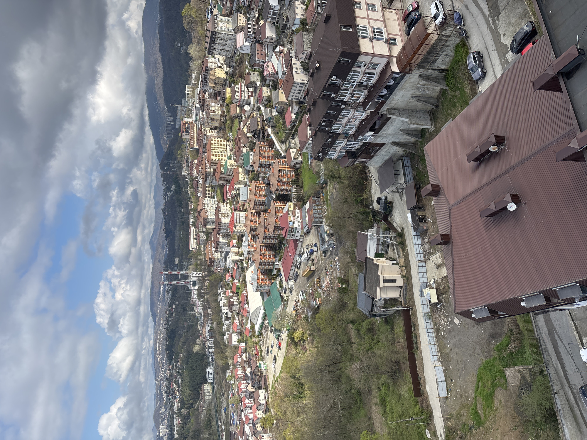 Tourist takes morning selfie overlooking Sochi valley
