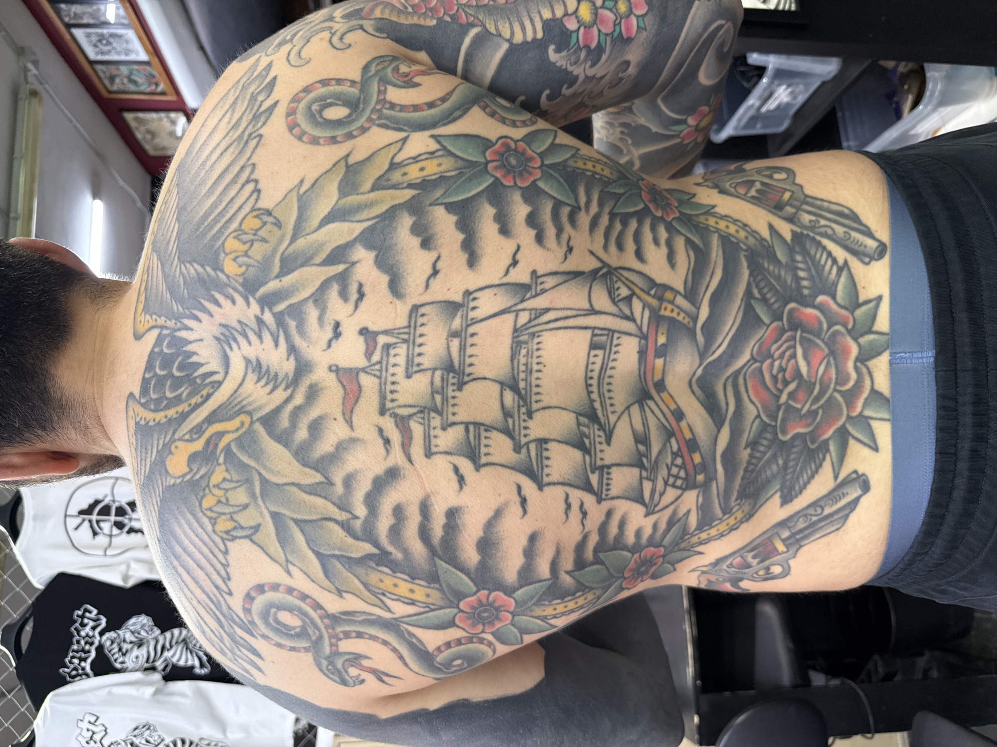 Heavily tattooed man spotted in Moscow with elaborate nautical back piece