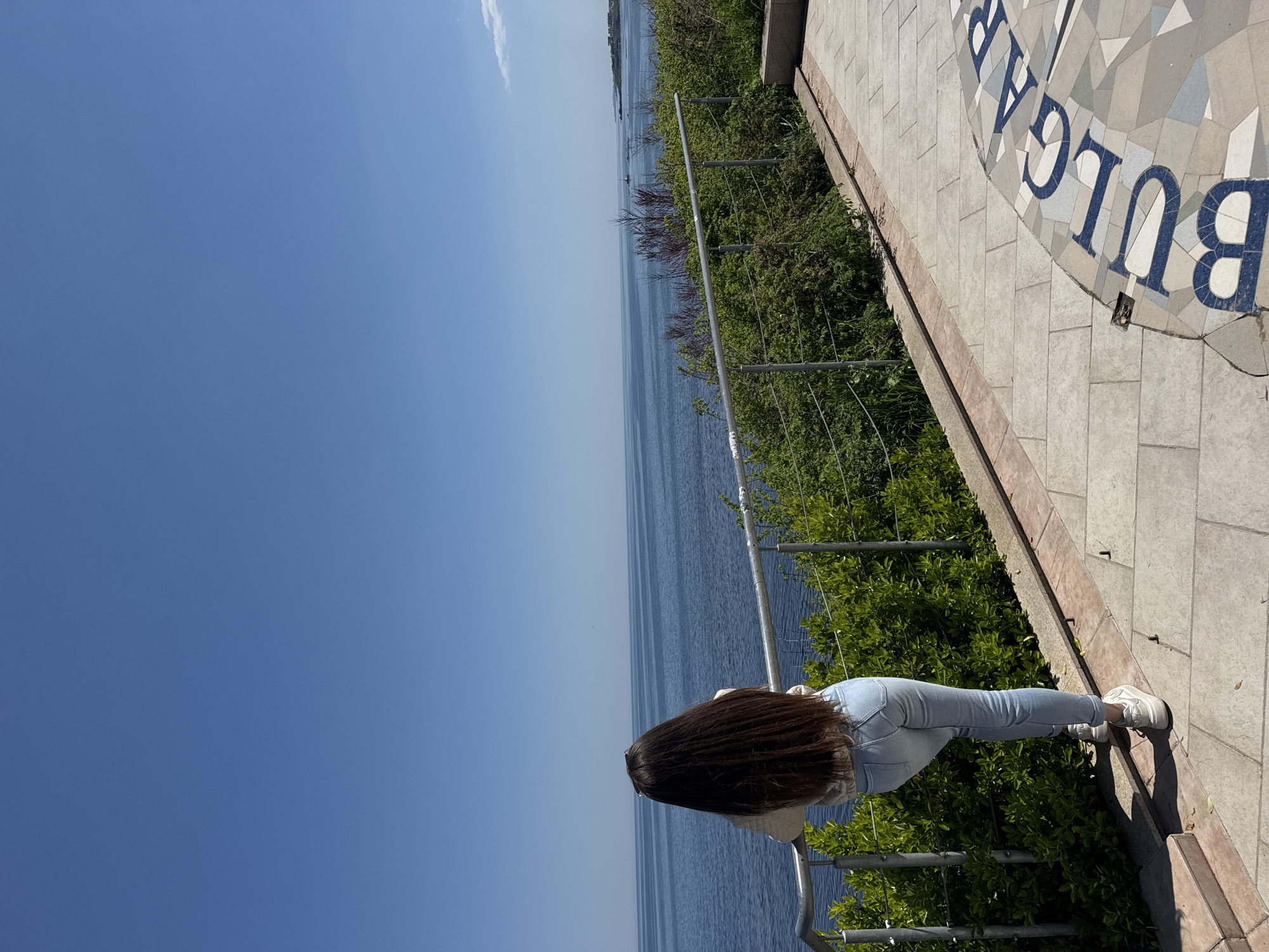 Woman enjoys Black Sea views from Tsarevo clifftop walkway