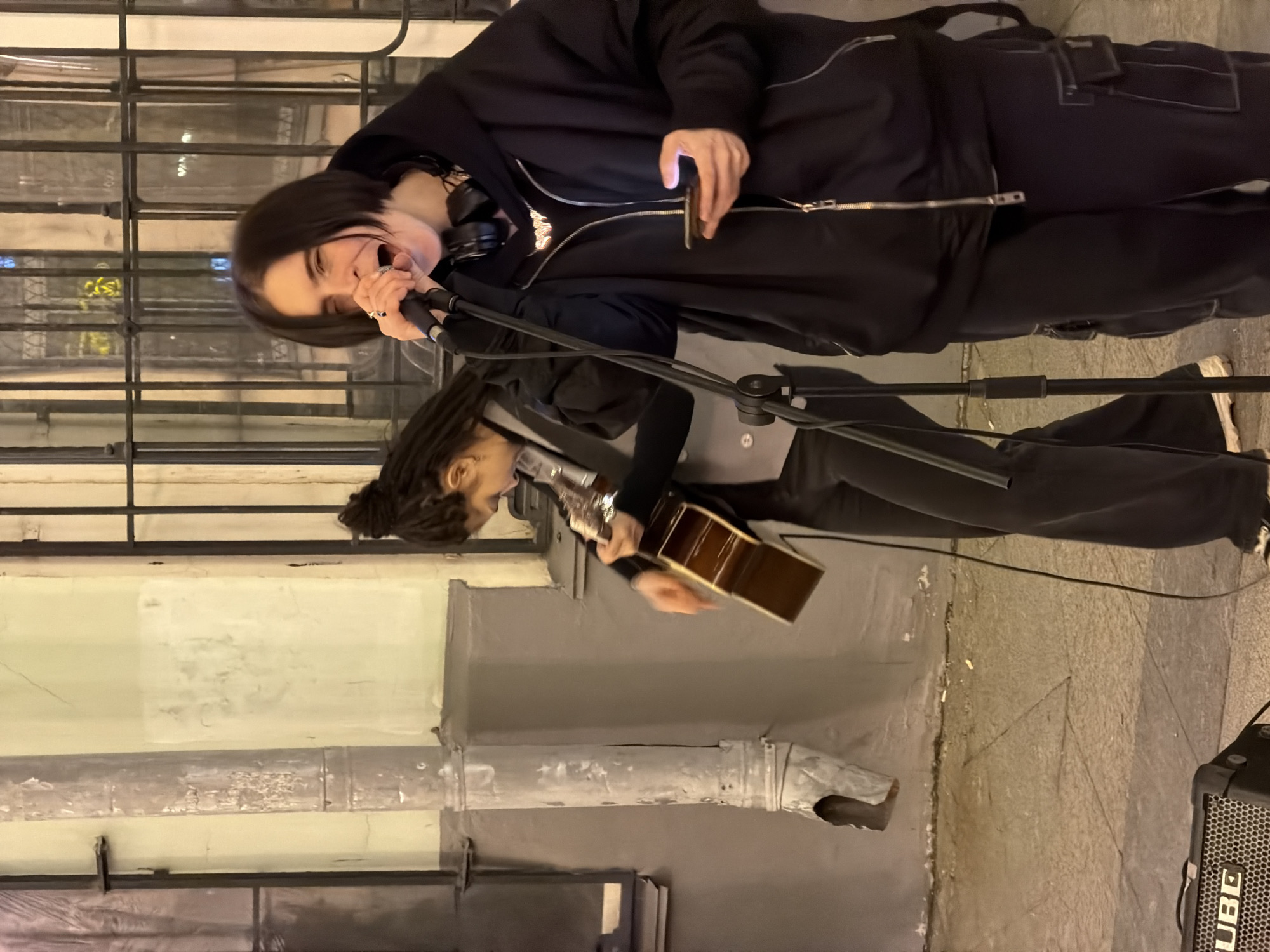 Evening street musicians perform acoustic set in Moscow