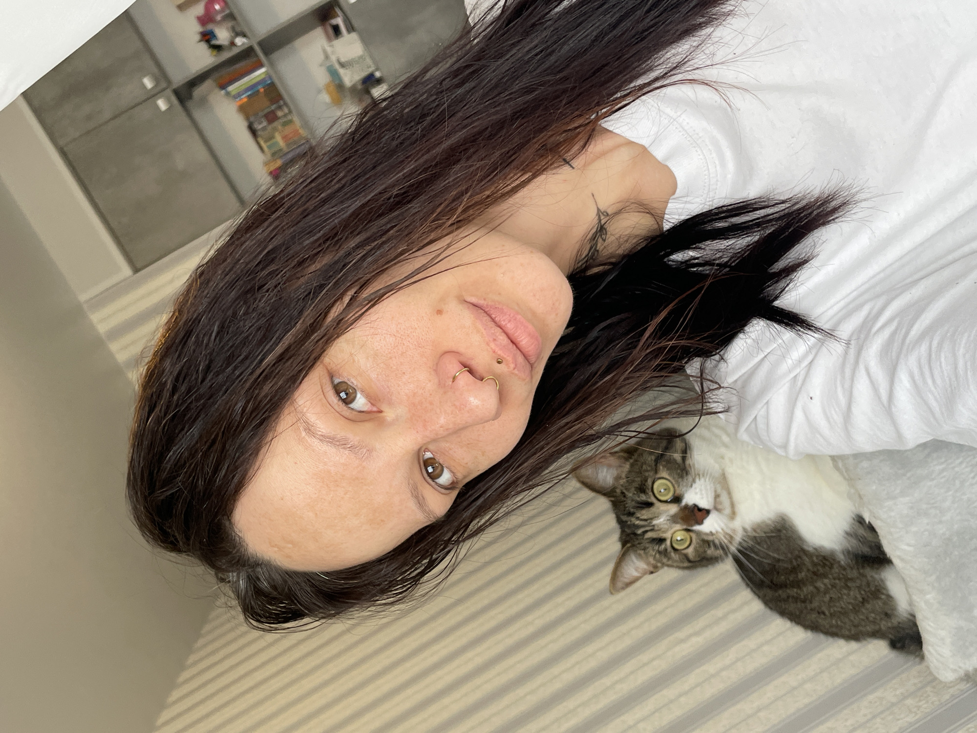 Morning selfie and cat photos captured in Izhevsk home