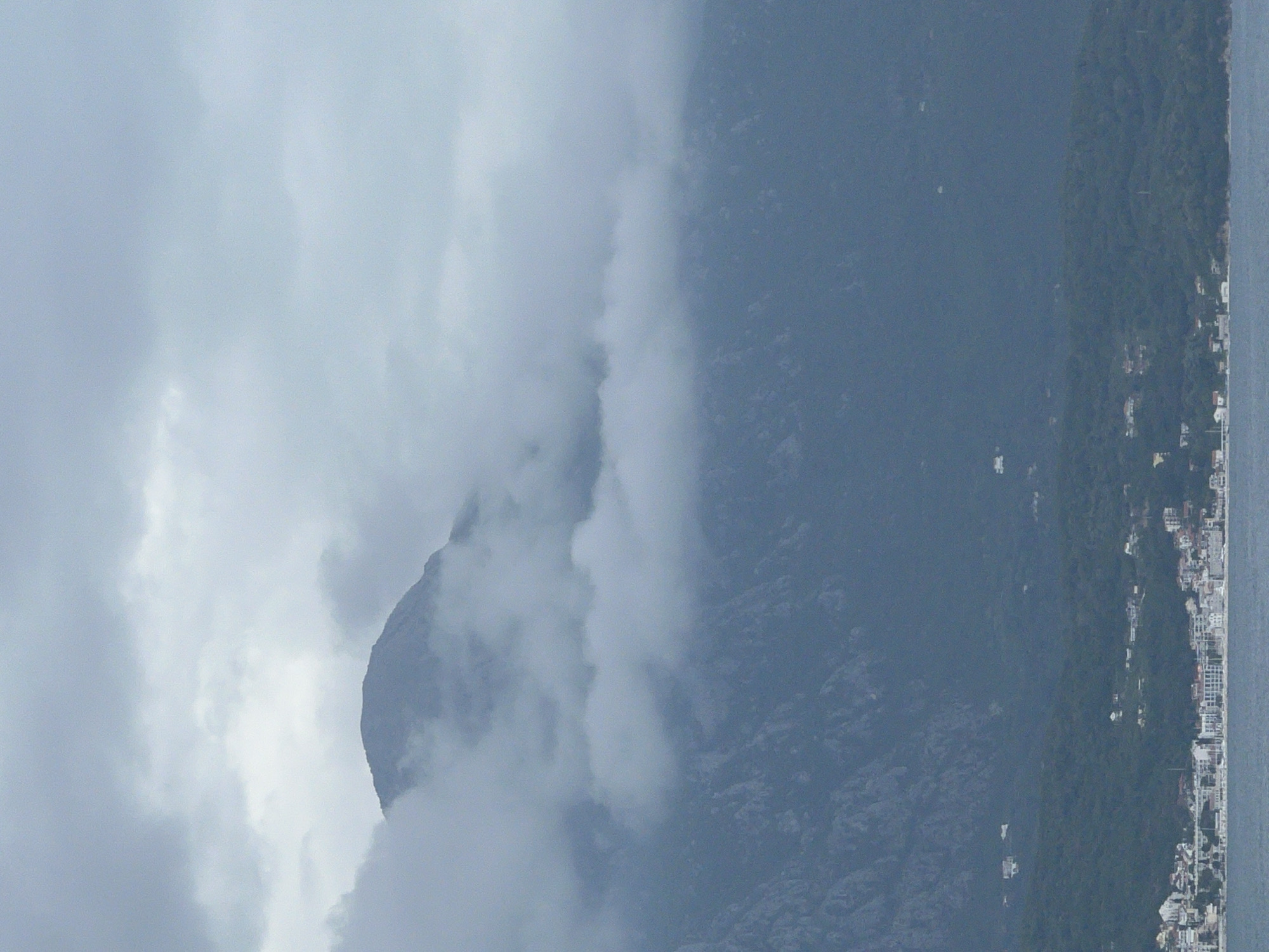 Clouded mountain photographed in coastal Luštica, Montenegro