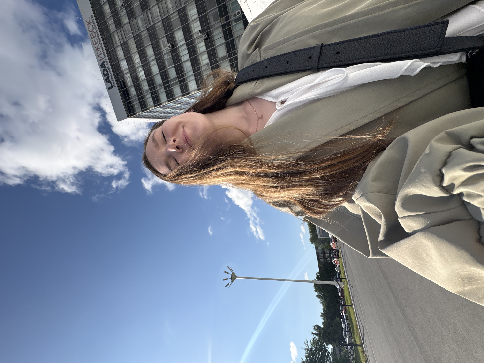 Woman photographed on sunny afternoon in Izhevsk, Russia