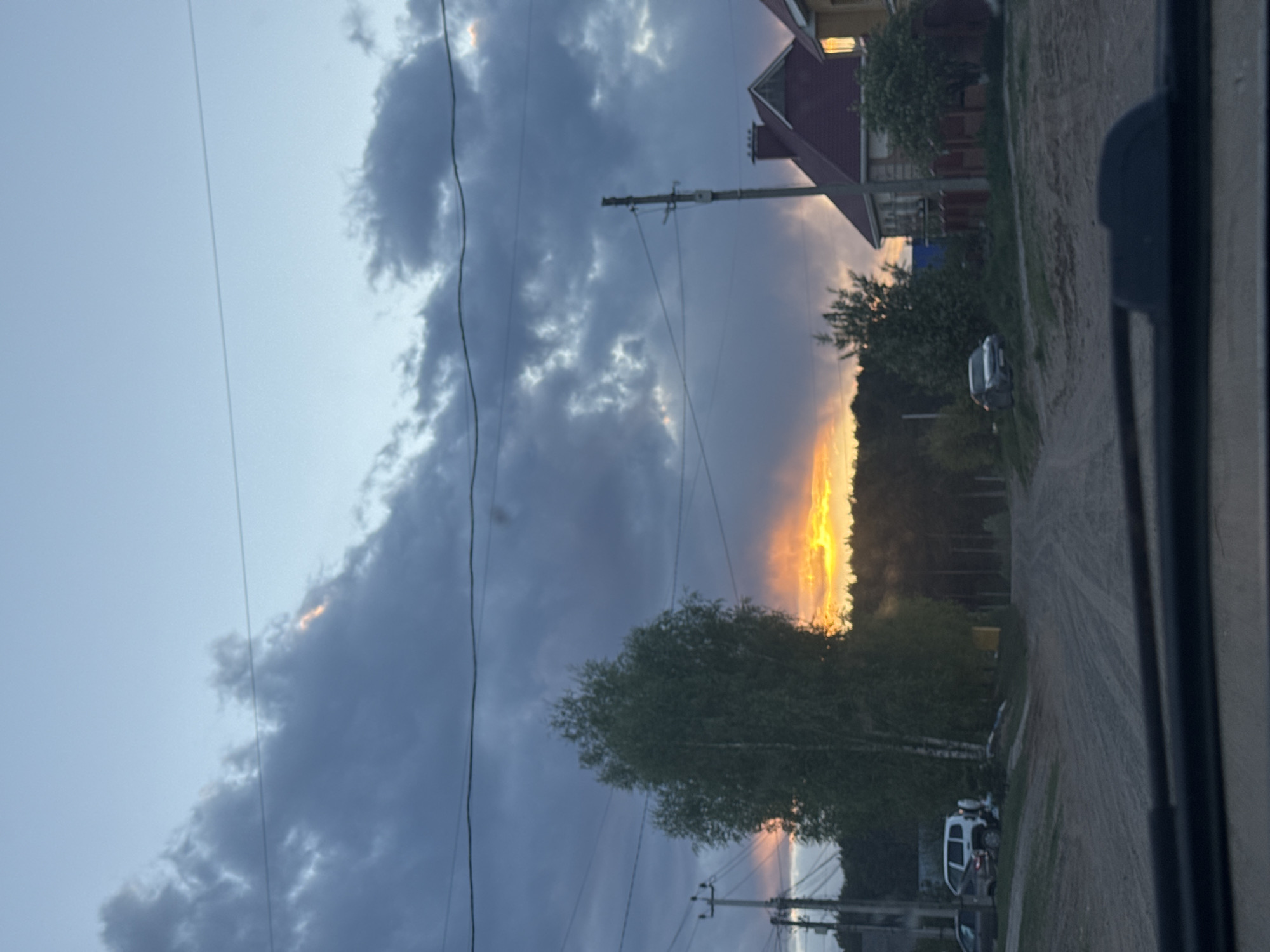Evening rural view captured from vehicle near Chaikovsky, Russia