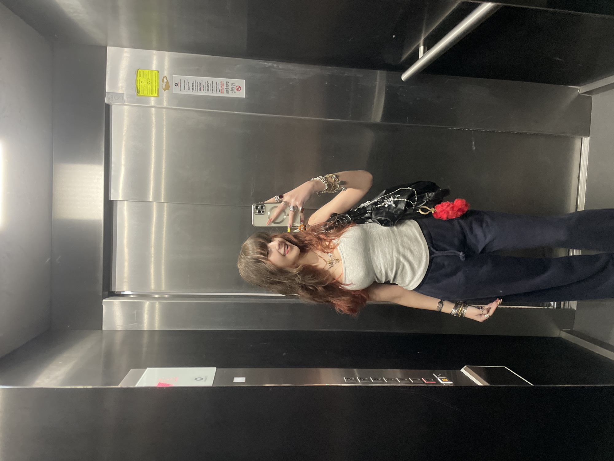 Woman takes elevator selfie in Raanana
