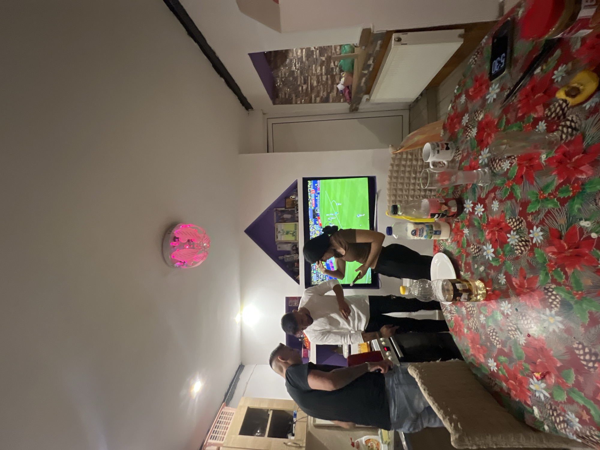 Relaxed home evening in Bulgaria: football, cooking, couch time.
