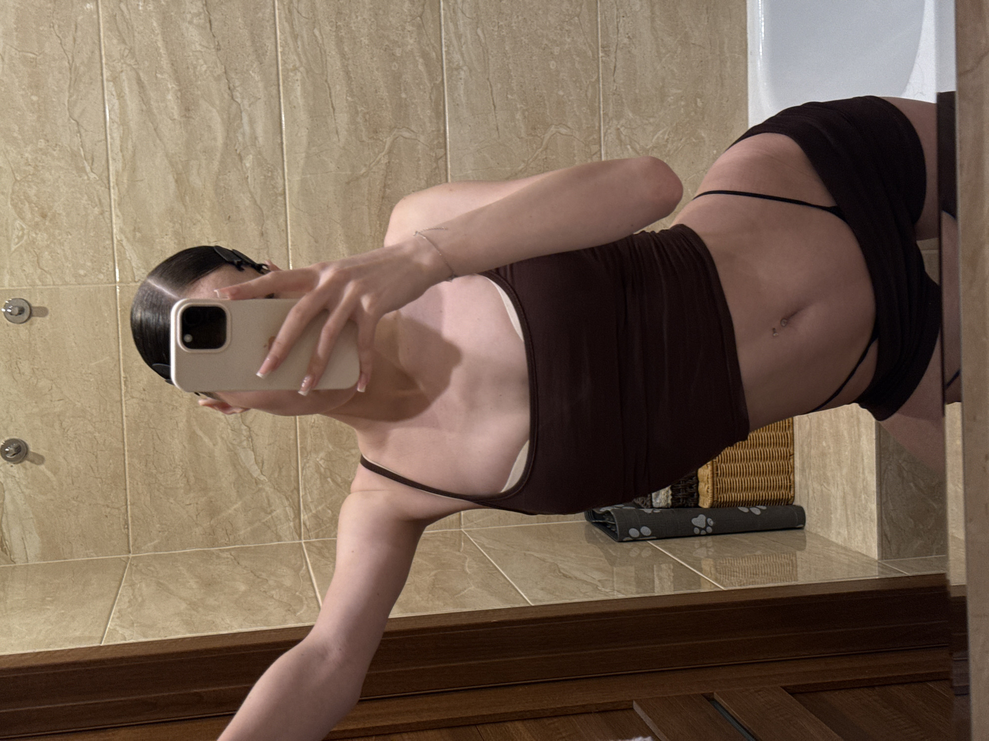 Bathroom selfies and rooftop dusk views across a Khimki evening