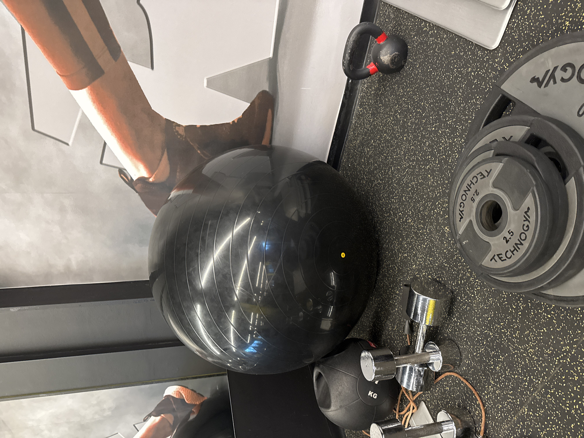 Gym equipment spotted on rubber floor in Sofia fitness facility