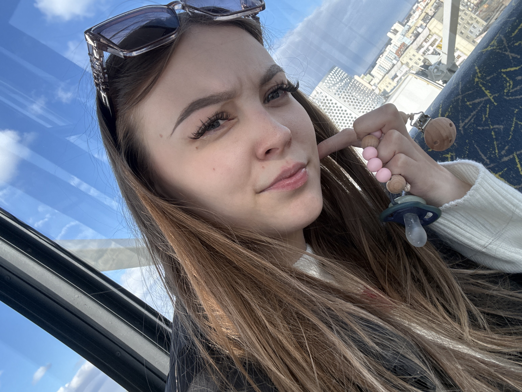Ferris wheel riders capture cityscape views in Yakutsk