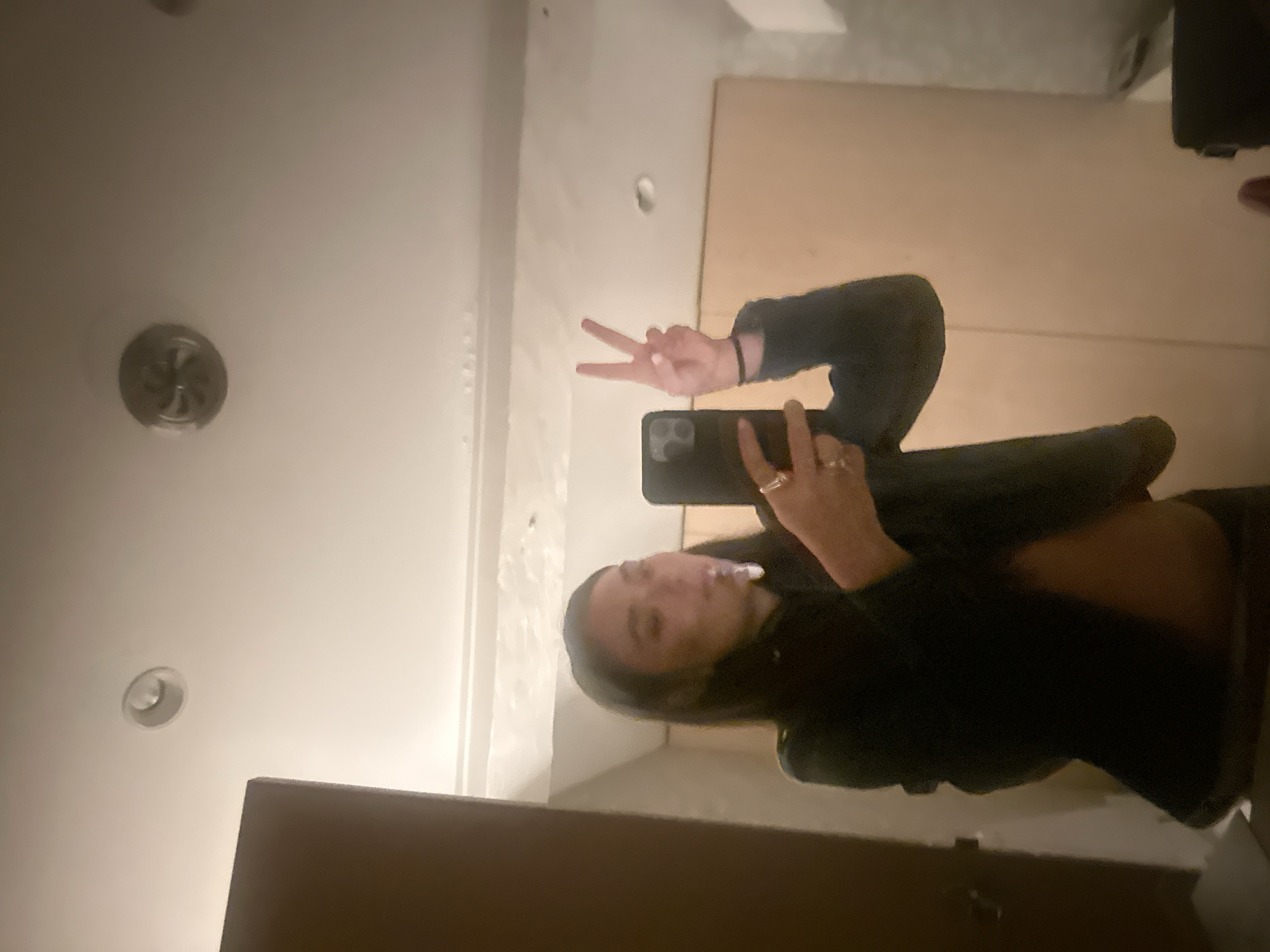 Person captures bathroom selfie, brushes teeth in Paris