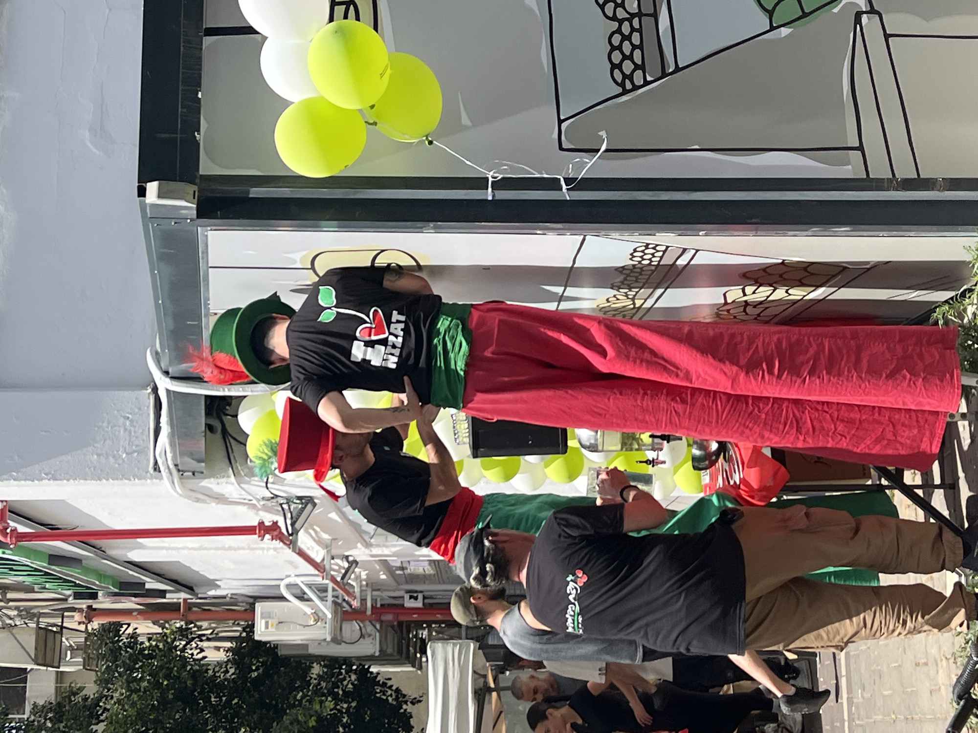 Public gathering observed in Givatayim during sunny Friday morning