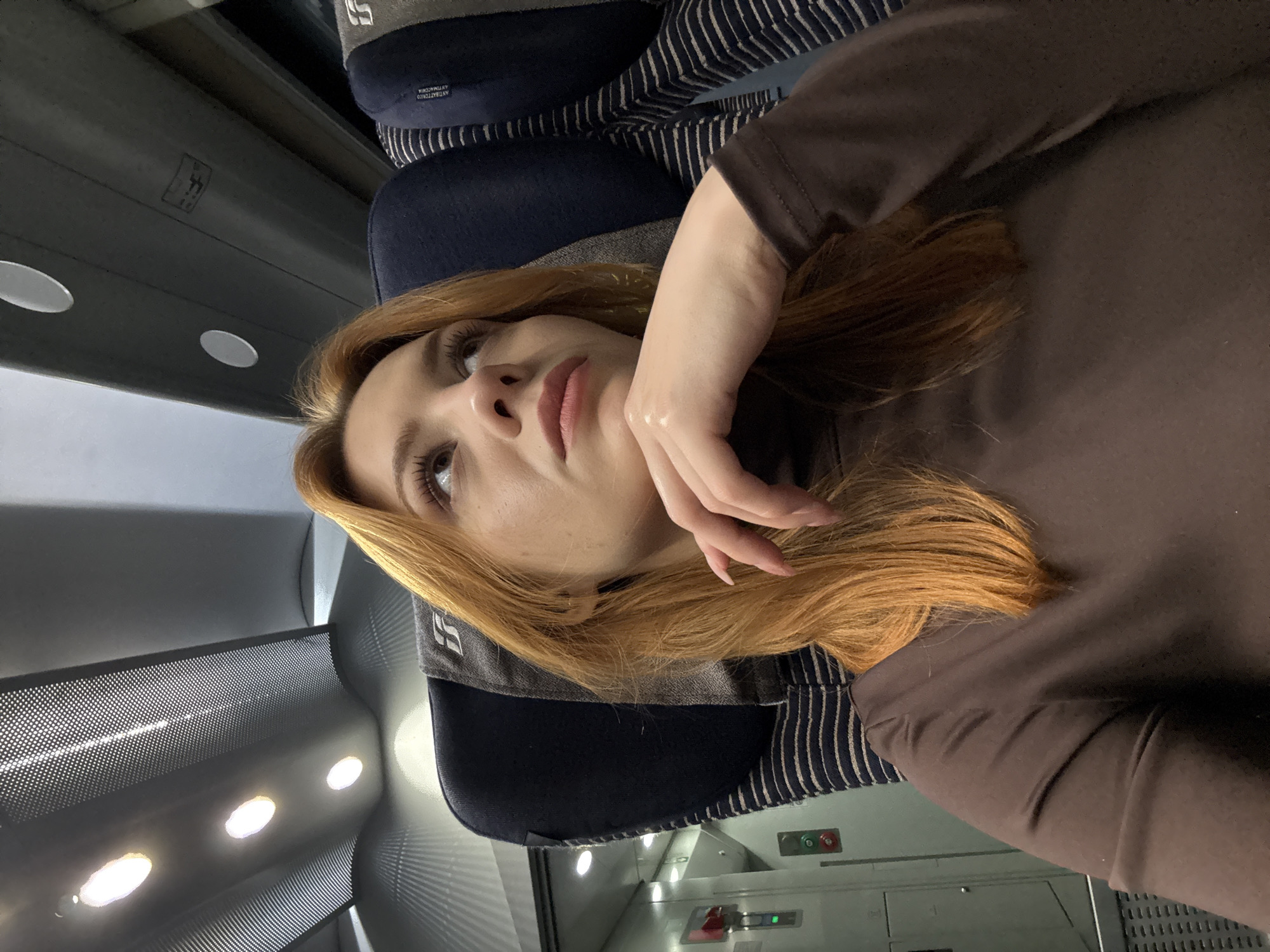 Woman observed resting in train car near Borgio Verezzi
